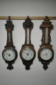 THREE LATE 19TH/EARLY 20TH OAK ANEROID BAROMETERS, two unsigned, one signed Munt of Worcester,