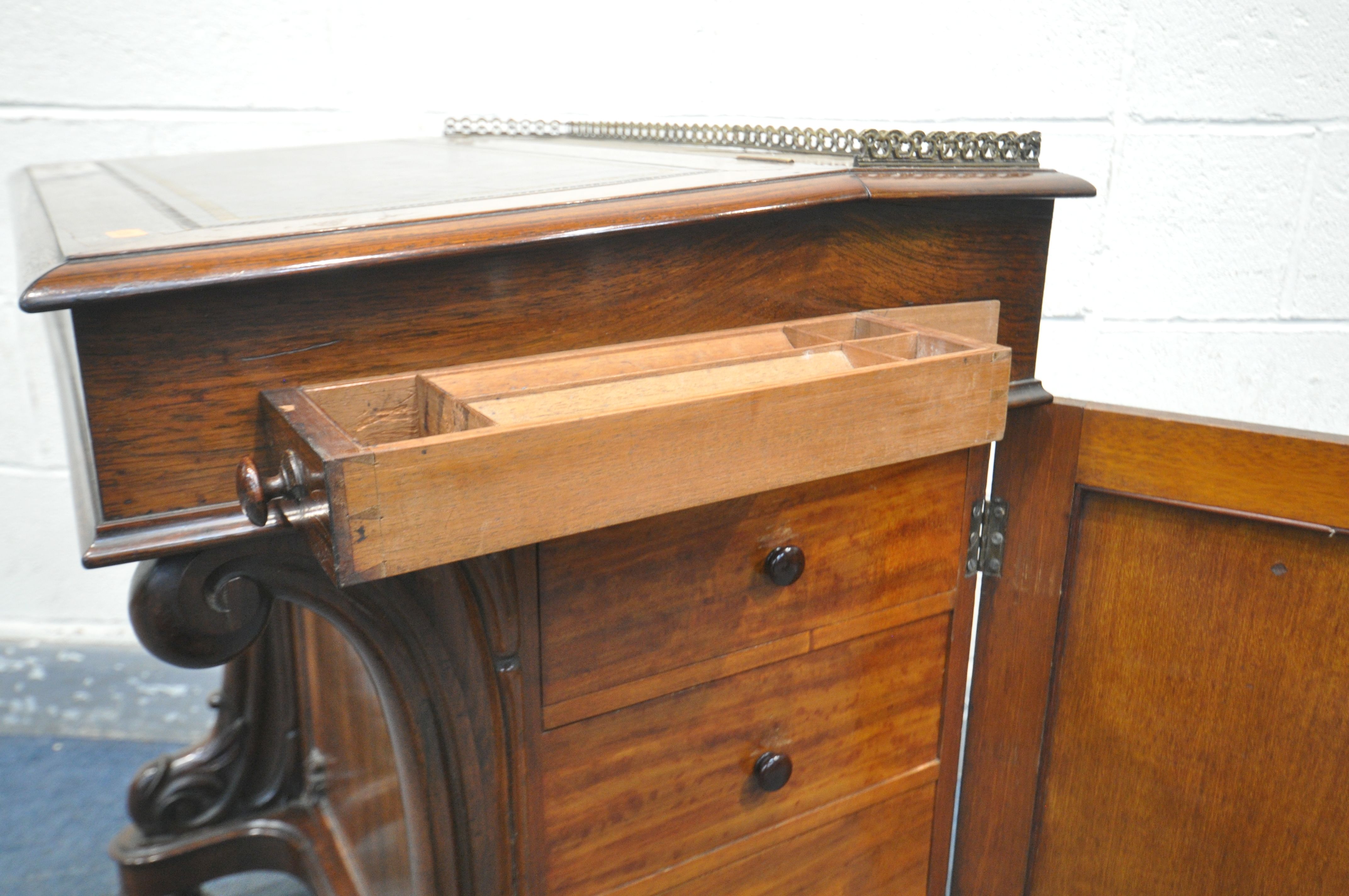 AN EARLY 19TH CENTURY ROSEWOOD DAVENPORT DESK, having a brass open fretwork gallery behind a leather - Image 8 of 9
