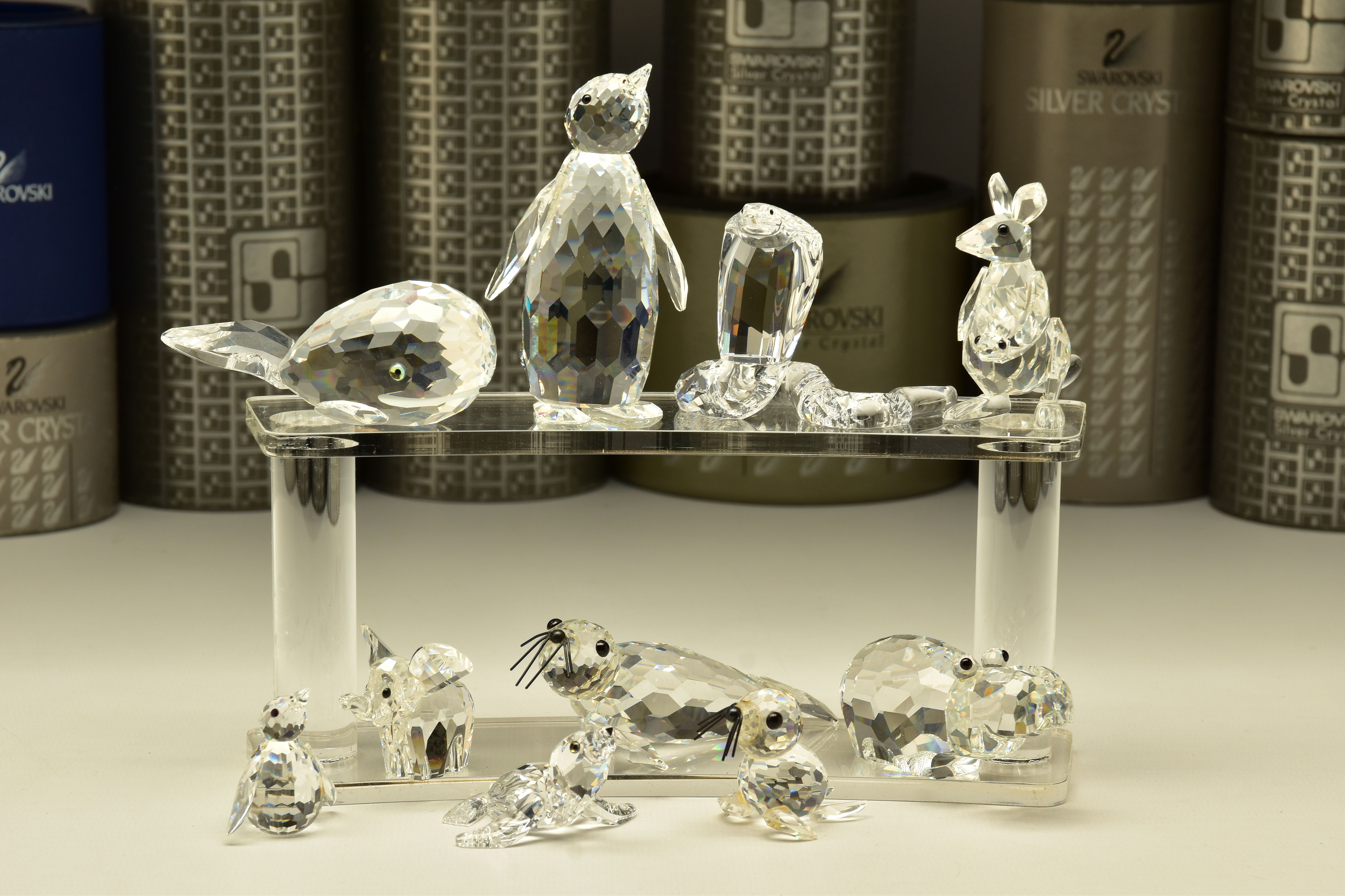 TEN BOXED SWAROVSKI CRYSTAL ORNAMENTS, from various collections, comprising three from African