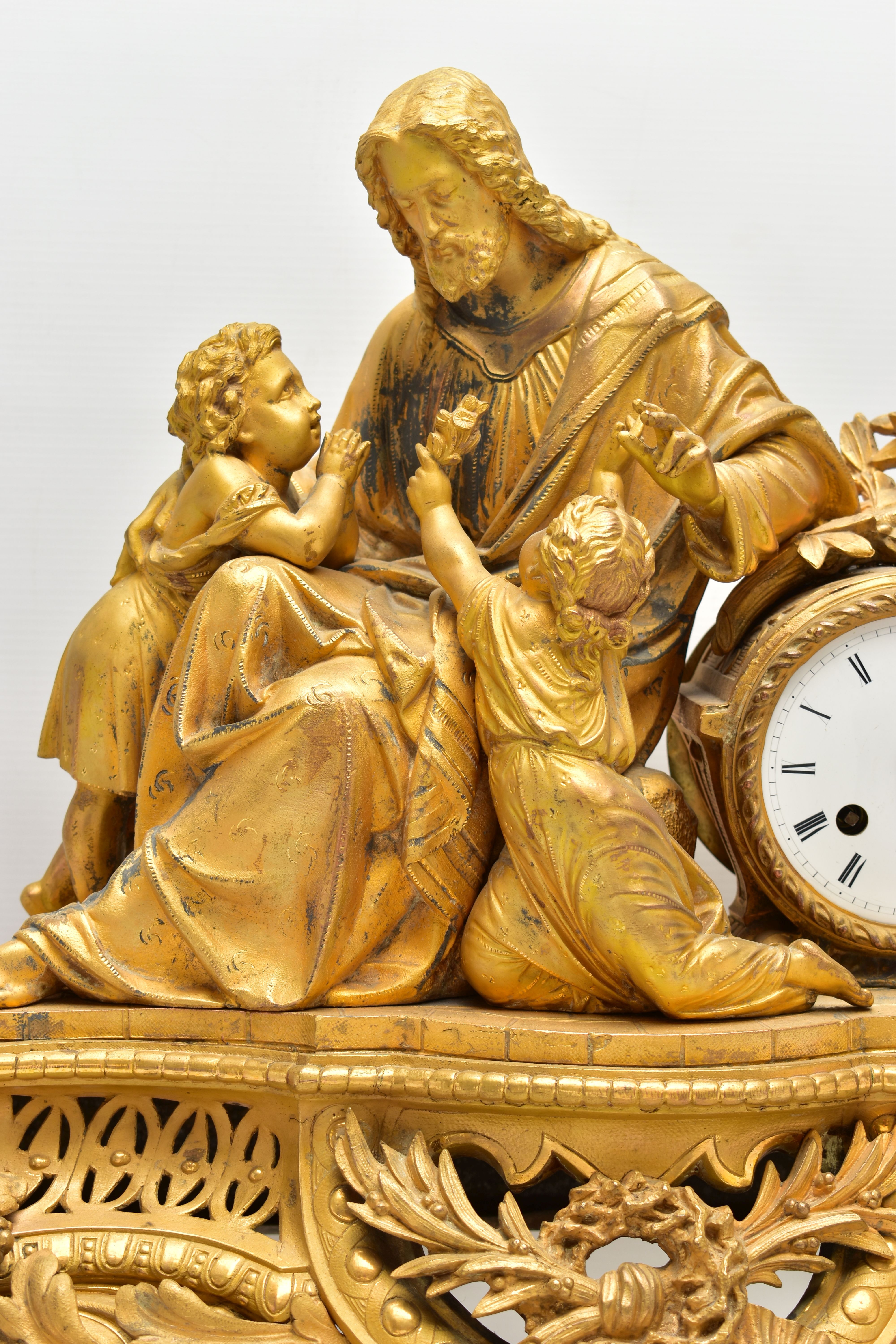 A MID 19TH CENTURY GILT METAL MANTEL CLOCK, cast with a seated figure of Christ and two children, - Image 2 of 11