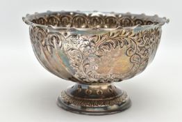 AN EDWARDIAN SILVER ROSE BOWL, wavy rim over wrythen and foliate repousse decoration, vacant