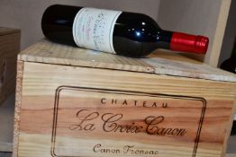 WINE, twelve bottles in original wood case of CHATEAU LA CROIX CANON 2000, CANON FRONSAC, 13% vol,