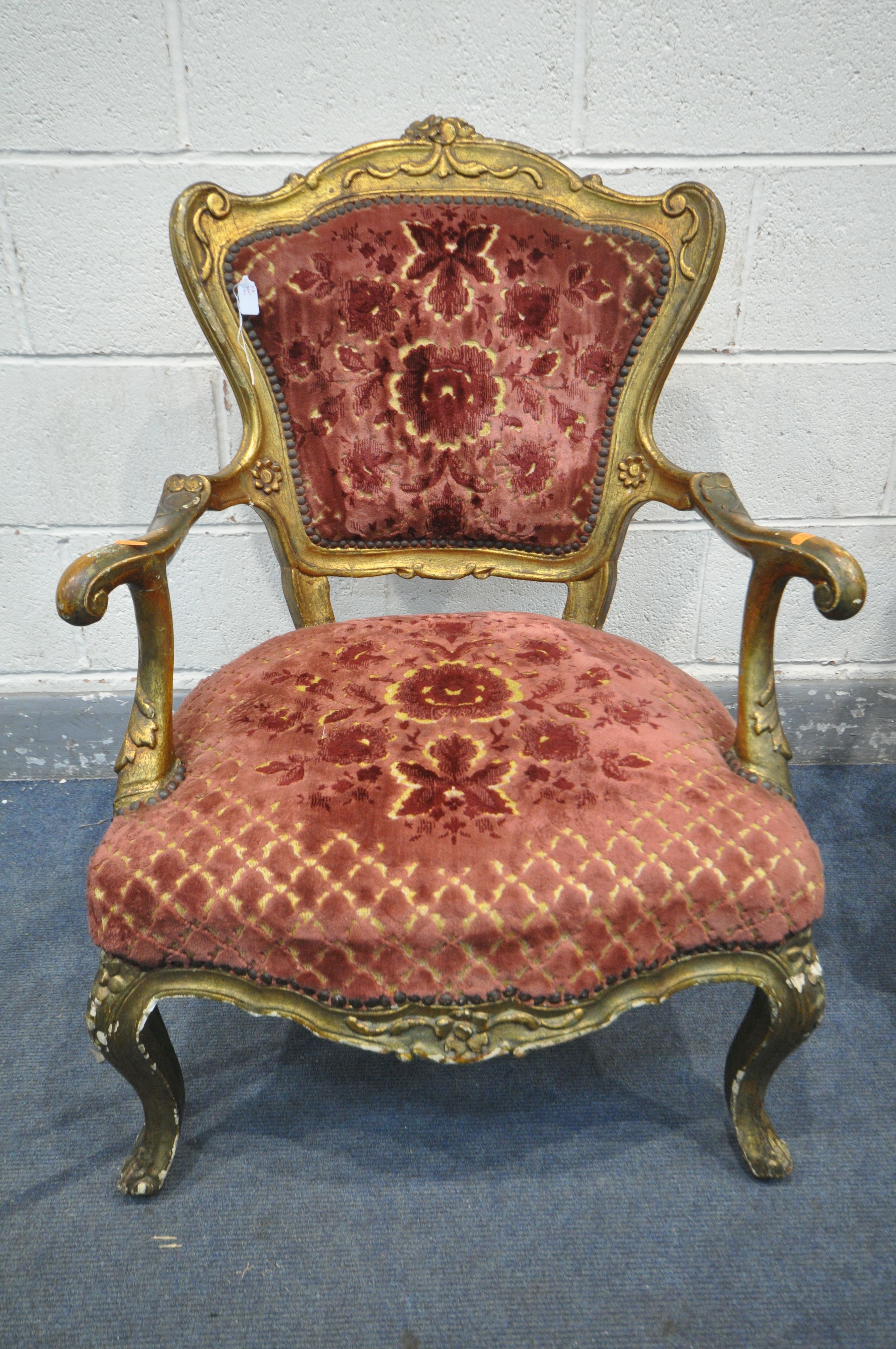 A PAIR OF 19TH CENTURY OR EARLIER LOUIS XV GILT FRAMED OPEN ARMCHAIRS, covered with later - Image 3 of 8