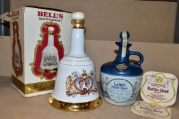 WHISKY & RUM, comprising one commemorative porcelain decanter of Bell's Scotch Whisky to commemorate