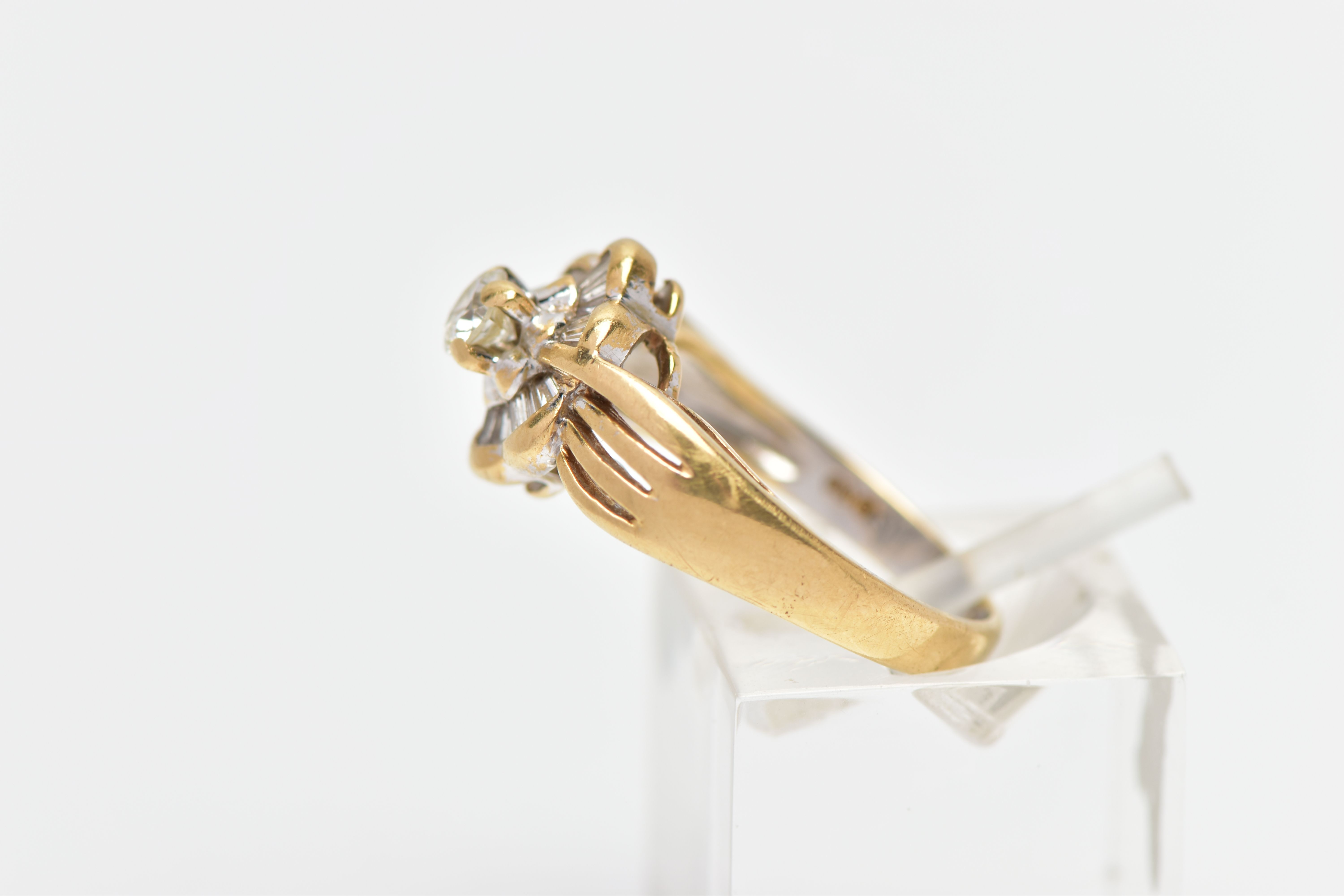 A MODERN YELLOW METAL DIAMOND CLUSTER RING, set with a principal round brilliant cut diamond, within - Image 2 of 8