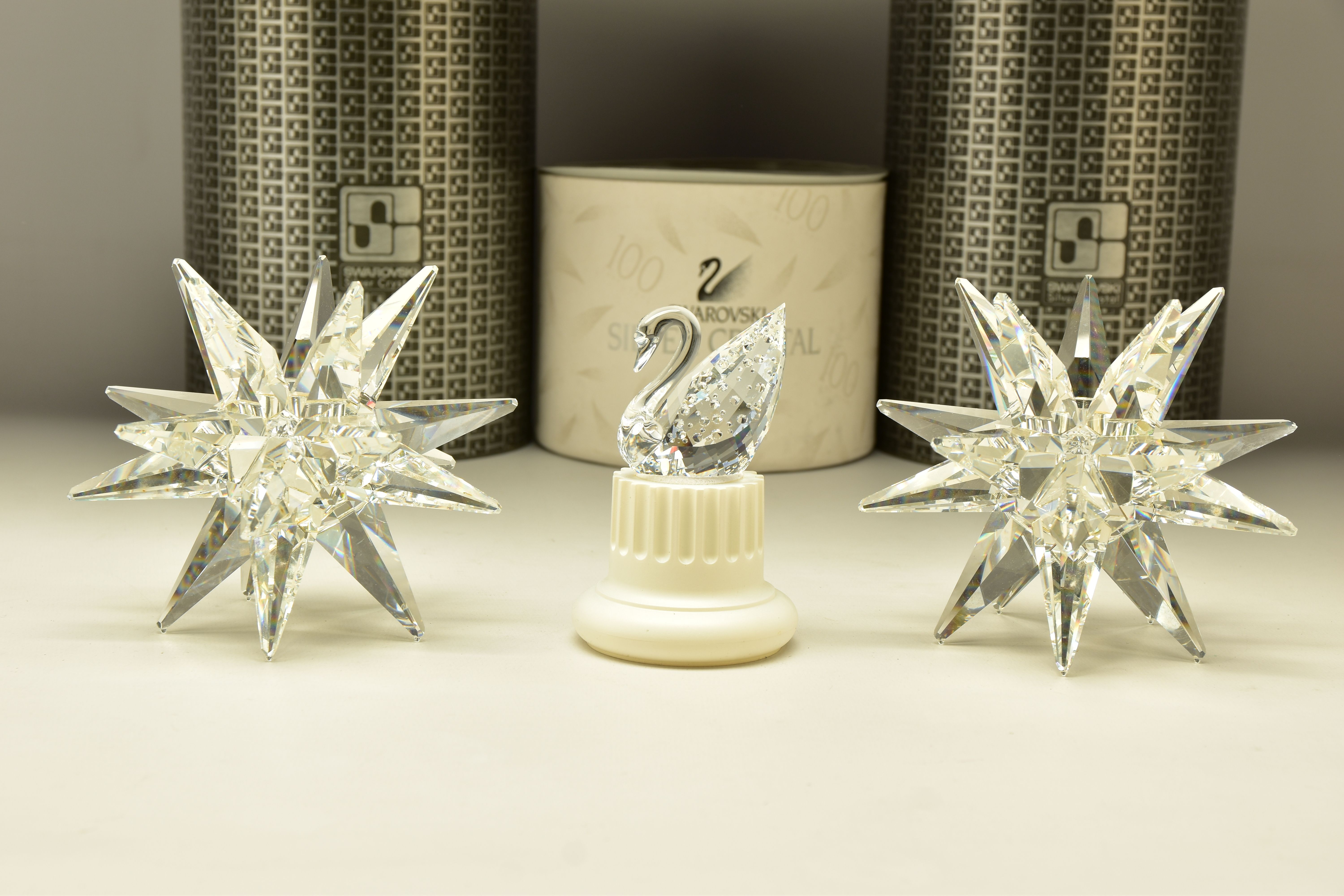 TWO BOXED SWAROVSKI CRYSTAL 143L STAR CANDLEHOLDERS (013748), 1987 retired 1996, height 11cm x width