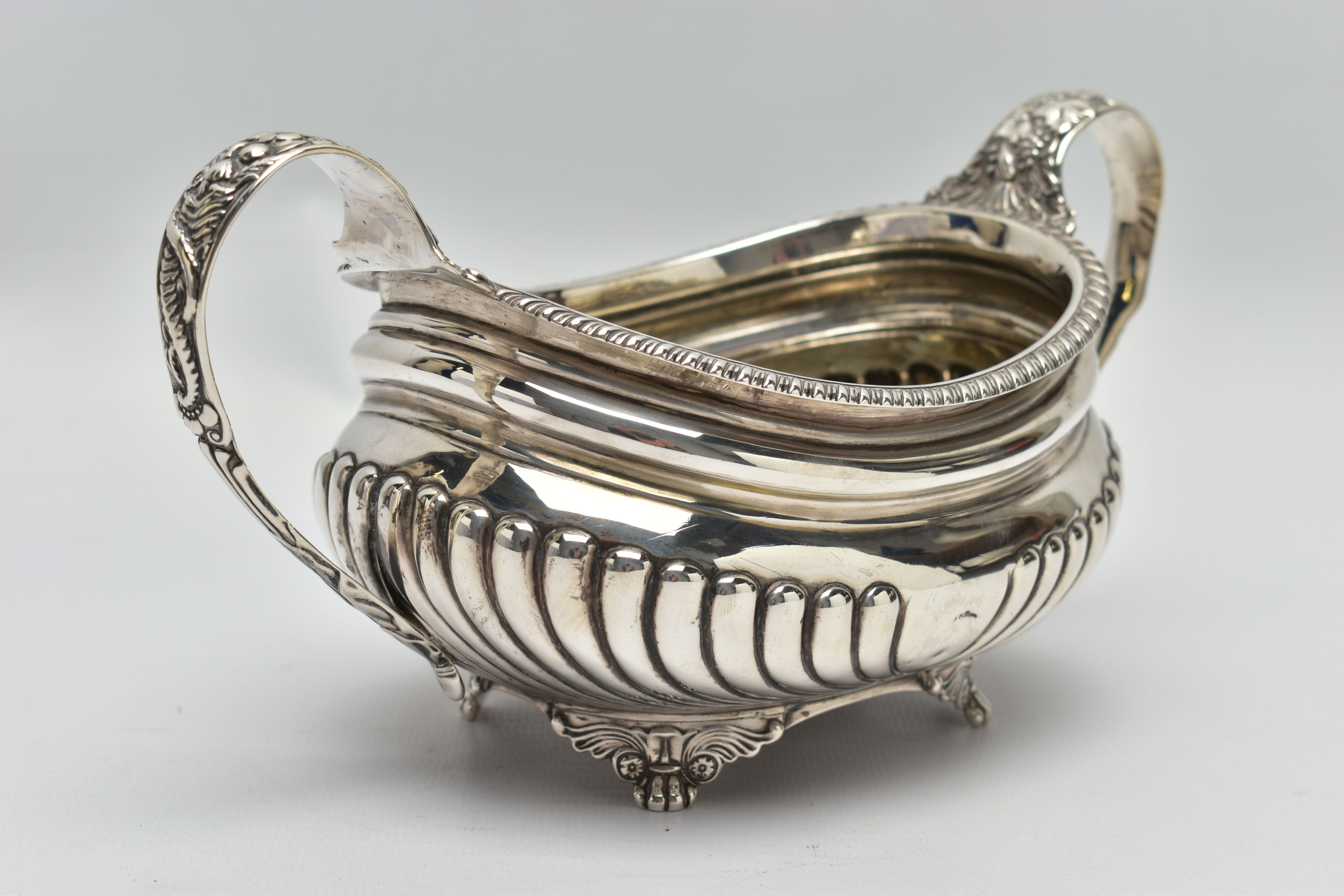 A GEORGE III SILVER TWIN HANDLED SUGAR BOWL OF OVAL FORM, gadrooned rim, cornucopia cast C scroll - Image 5 of 9