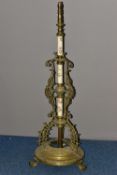 A LATE VICTORIAN BRASS AND CERAMIC TELESCOPIC STANDARD LAMP BASE, INCOMPLETE, the three ceramic