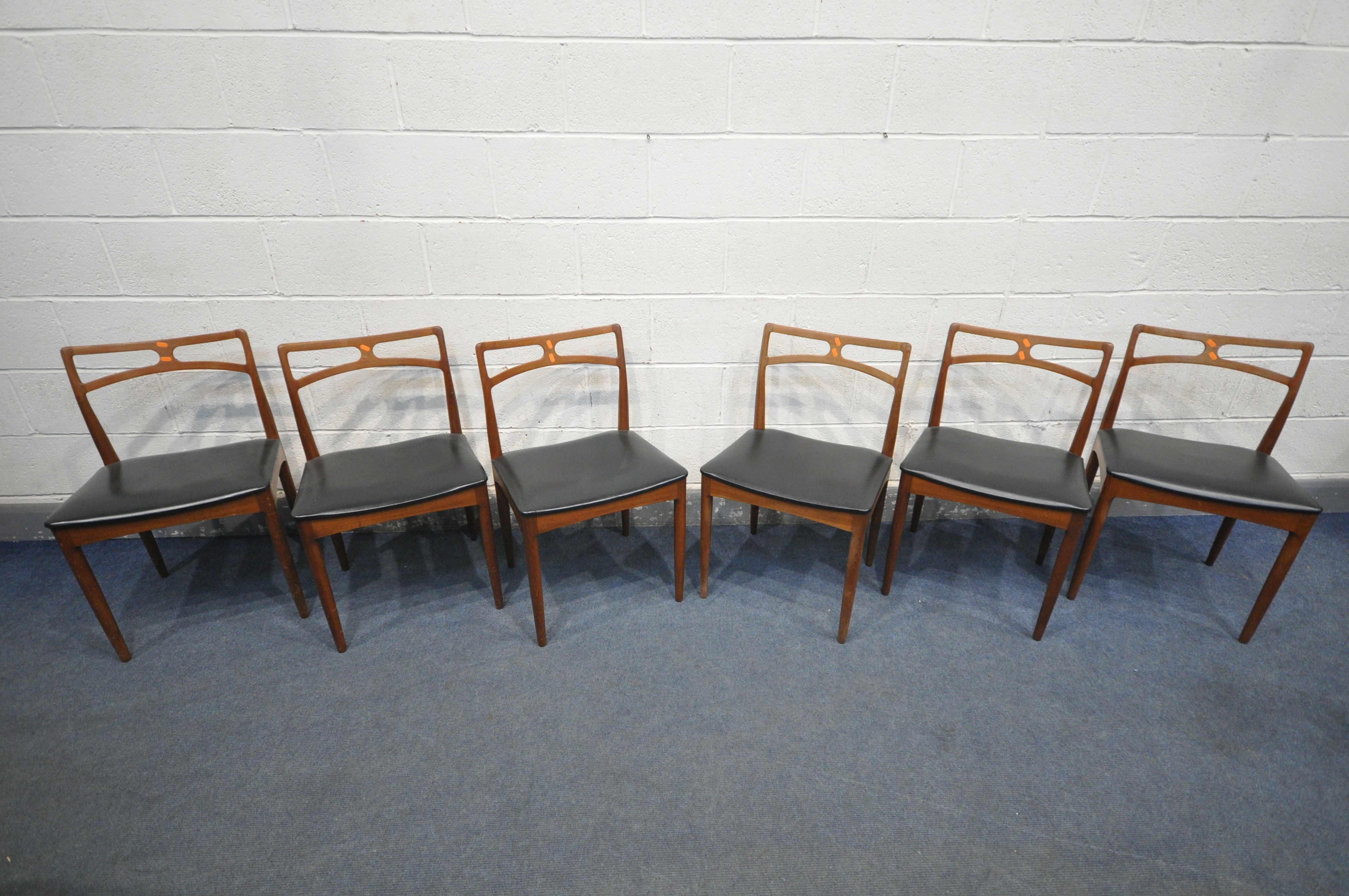 JOHANNES ANDERSEN FOR CHRISTIAN LINNEBERGS MØBELFABRIK, a set of six Danish teak dining chairs, with