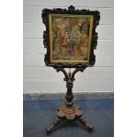 A VICTORIAN ROSEWOOD FIRESCREEN, the shaped foliate frame surrounding needlework scene behind a