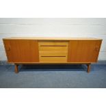 NILS JONSSON FOR HUGO TROEDS, A MID CENTURY MODEL TEAK SIDEBOARD, with two sliding doors that are