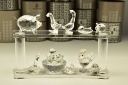 TEN BOXED SWAROVSKI CRYSTAL ORNAMENTS, from various collections, comprising Birds Nest (013842) 1987