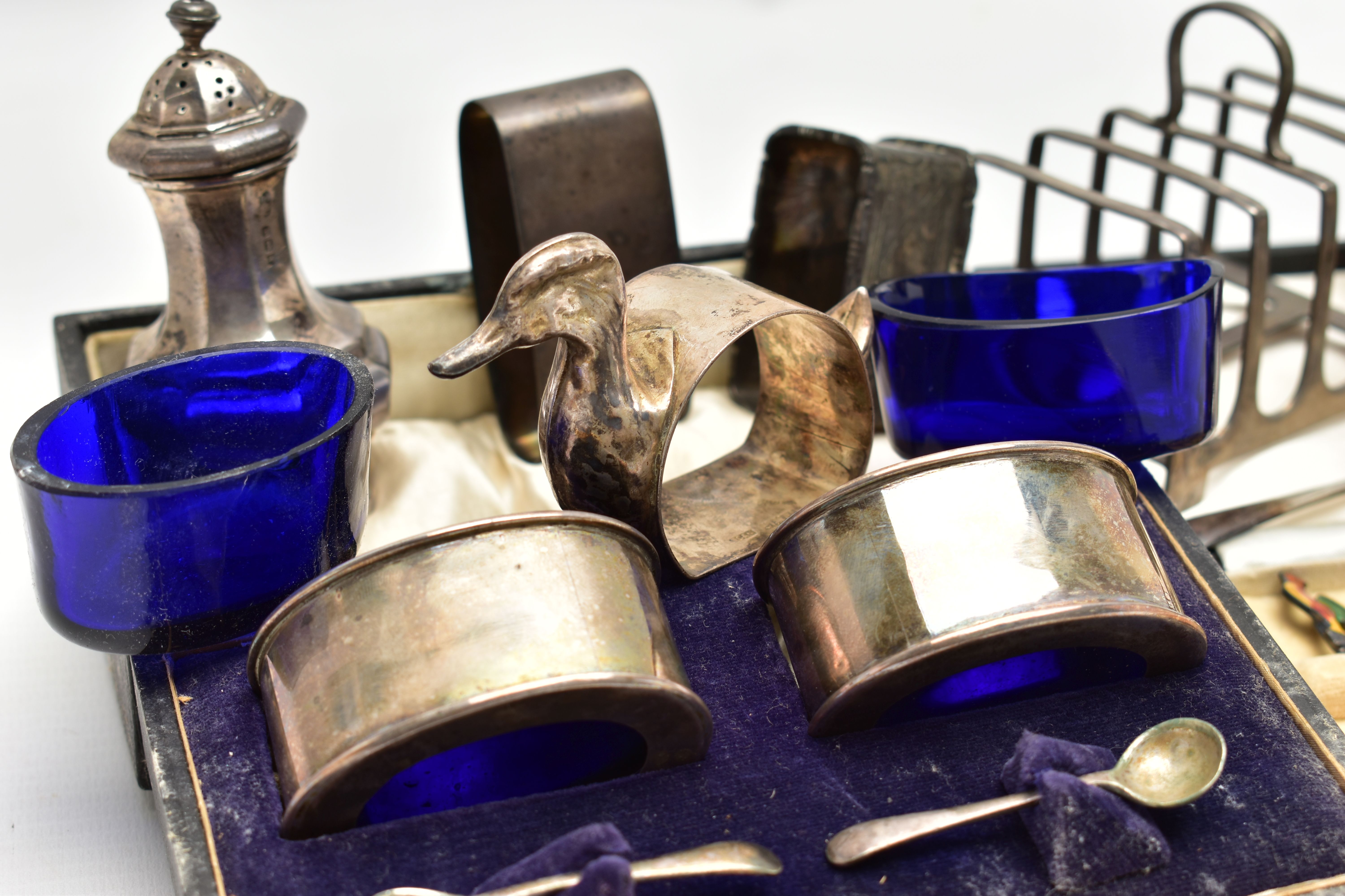 A PARCEL OF SILVER CRUET ITEMS, NAPKIN RINGS, TOAST RACK, ETC, including a cased set of six cocktail - Image 3 of 7