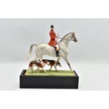 A ROYAL WORCESTER PORCELAIN FIGURE GROUP 'HUNTSMAN AND HOUNDS' MODELLED BY DORIS LINDER, no.3115,