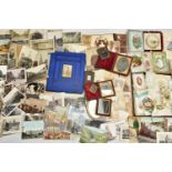 PHOTOGRAPHS, PAPER LACE & POSTCARDS, a collection of approximately thirty-five Victorian Paper