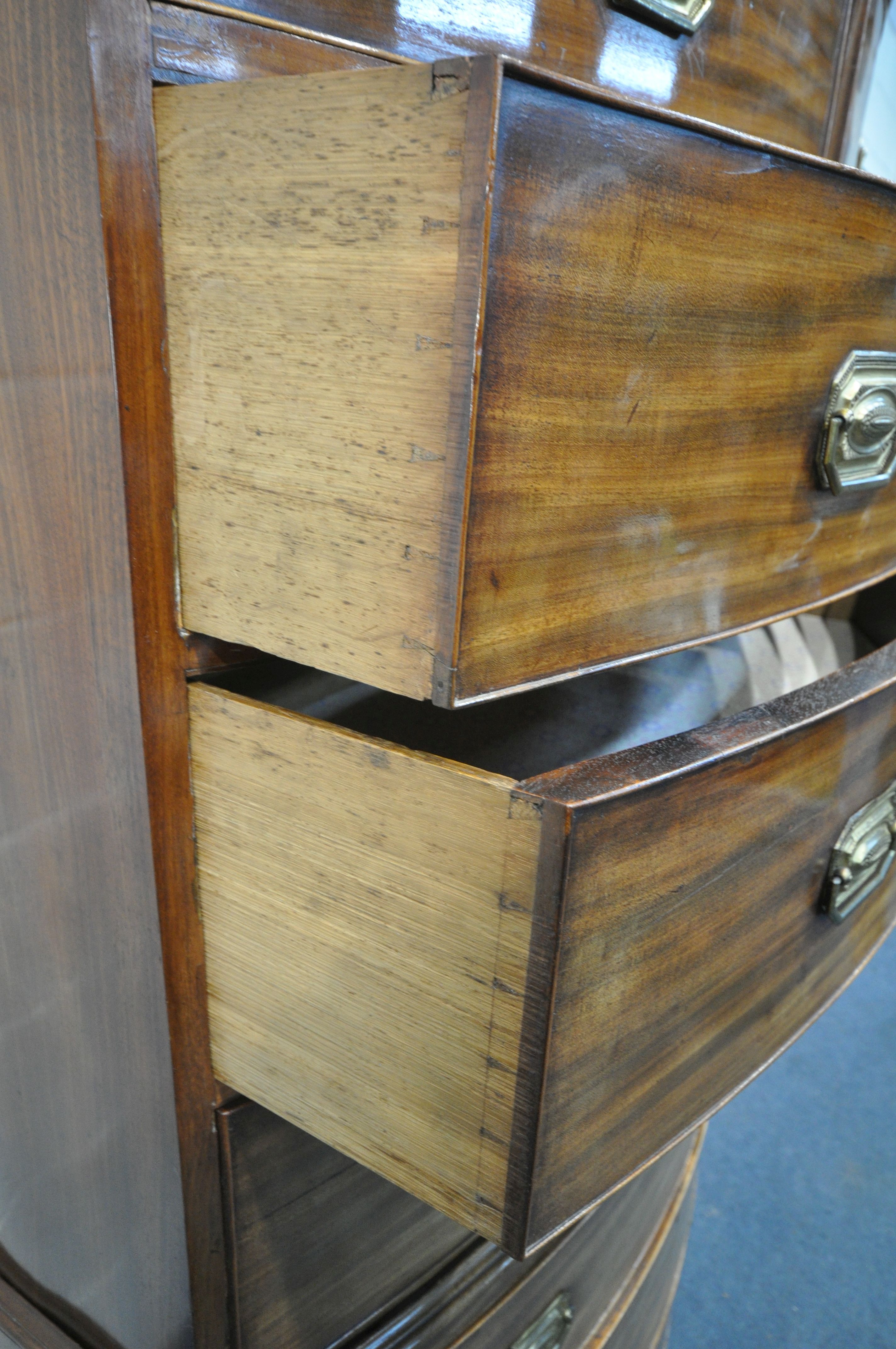 A GEORGE IV WALNUT BOWFRONT CHEST ON CHEST, of two short over six long graduated drawers, brass - Image 9 of 11