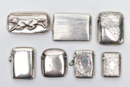 FIVE EDWARDIAN AND GEORGE V SILVER VESTA CASES, A SILVER MATCHBOOK SLEEVE AND AN IMPORTED STERLING