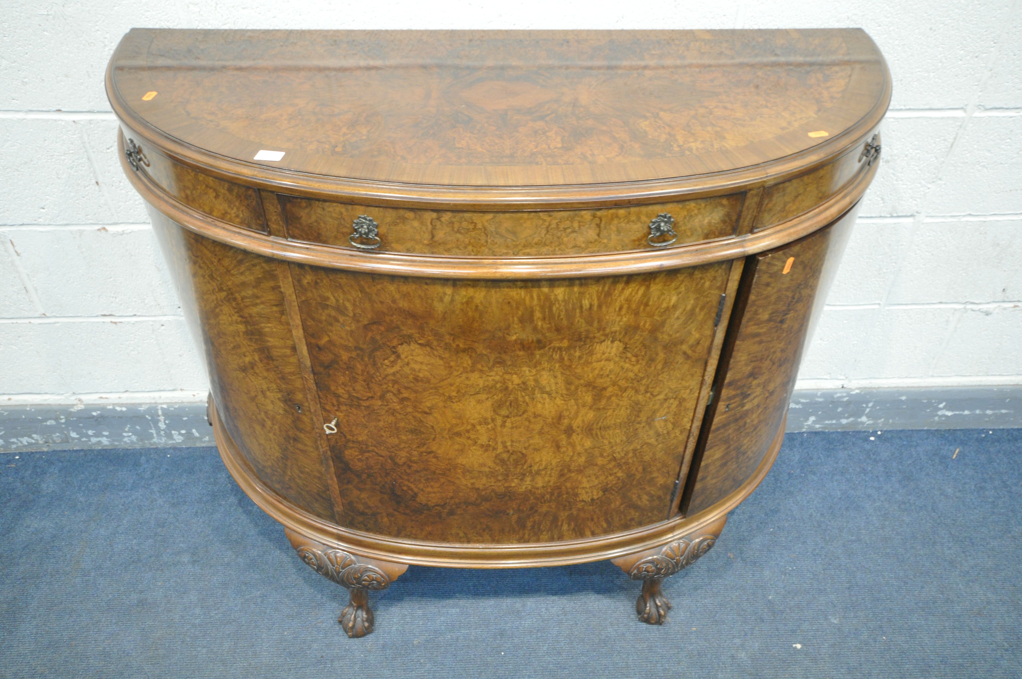 AN EARLY TO MID 20TH CENTURY MAPLE AND CO BURR WALNUT DEMI LUNE SIDE CABINET, with three frieze - Bild 2 aus 6