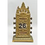 A LATE VICTORIAN BRASS PERPETUAL CALENDAR BY WILLIAM TONKS & SONS, the front plate cast with foliate