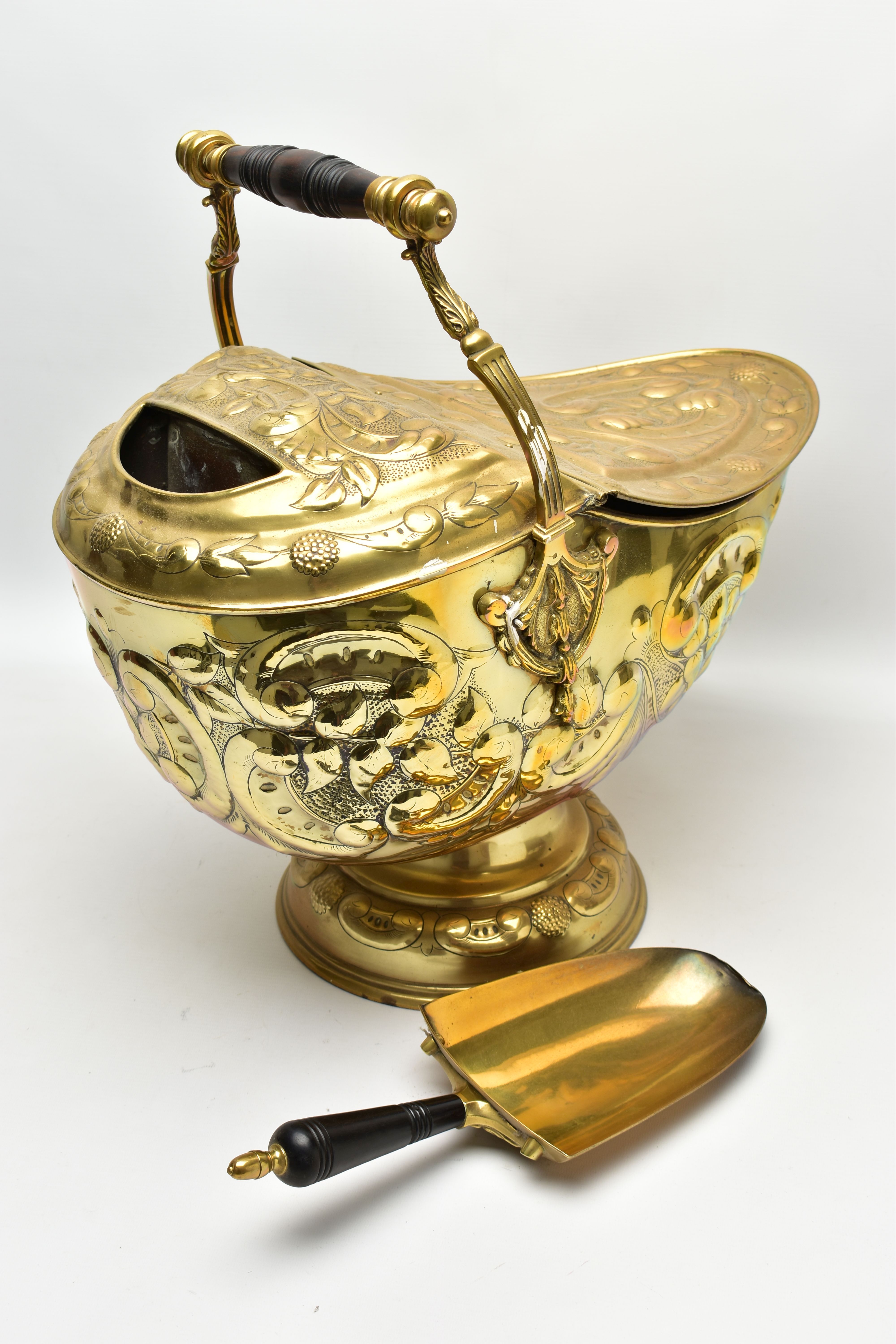 A LATE VICTORIAN / EDWARDIAN HELMET SHAPED COAL SCUTTLE, the turned wooden handle on a fixed - Image 8 of 9