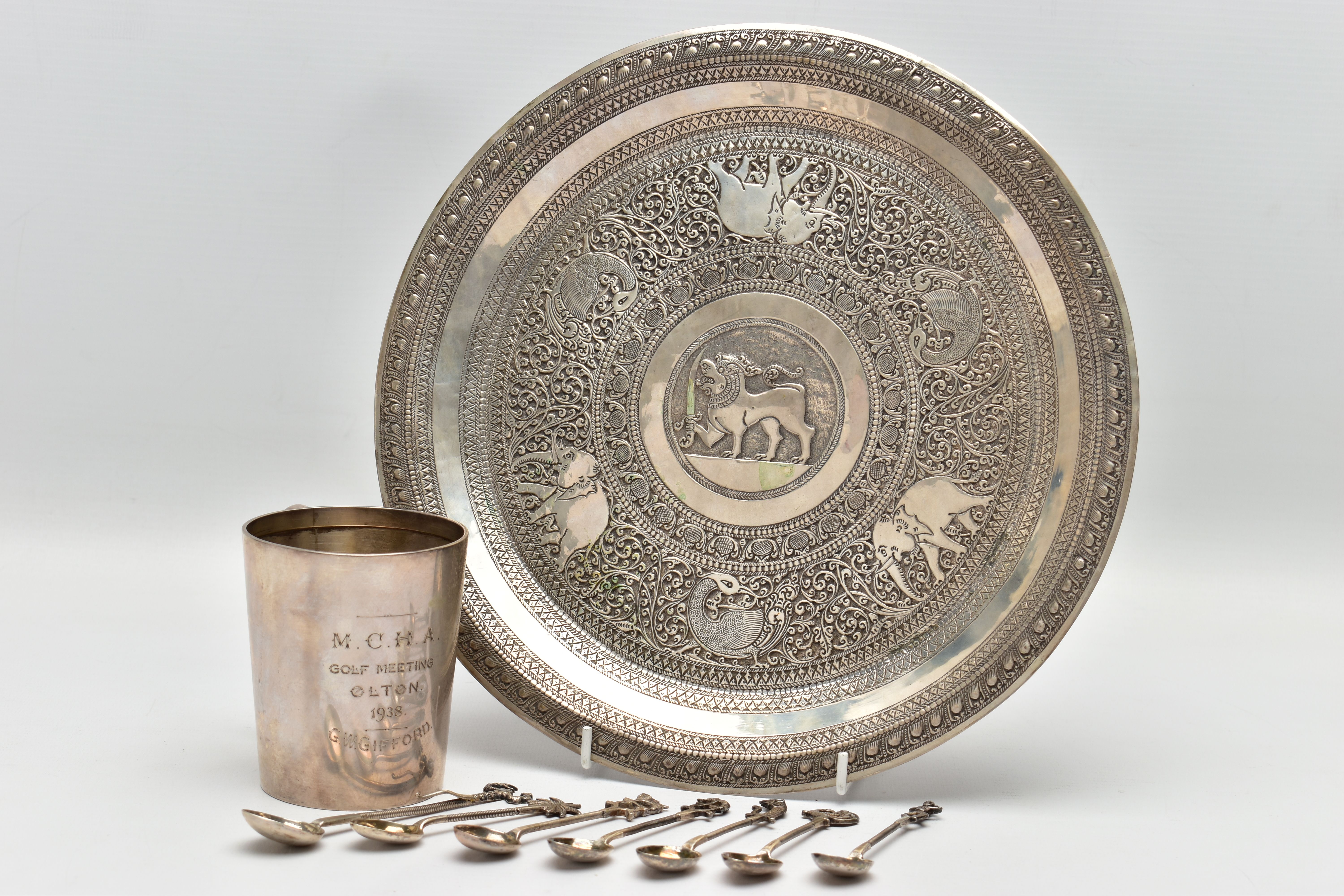 A GEORGE VI SILVER MUG, AN INDIAN WHITE METAL TRAY AND SEVEN INDIAN WHITE METAL COFFEE SPOONS, the