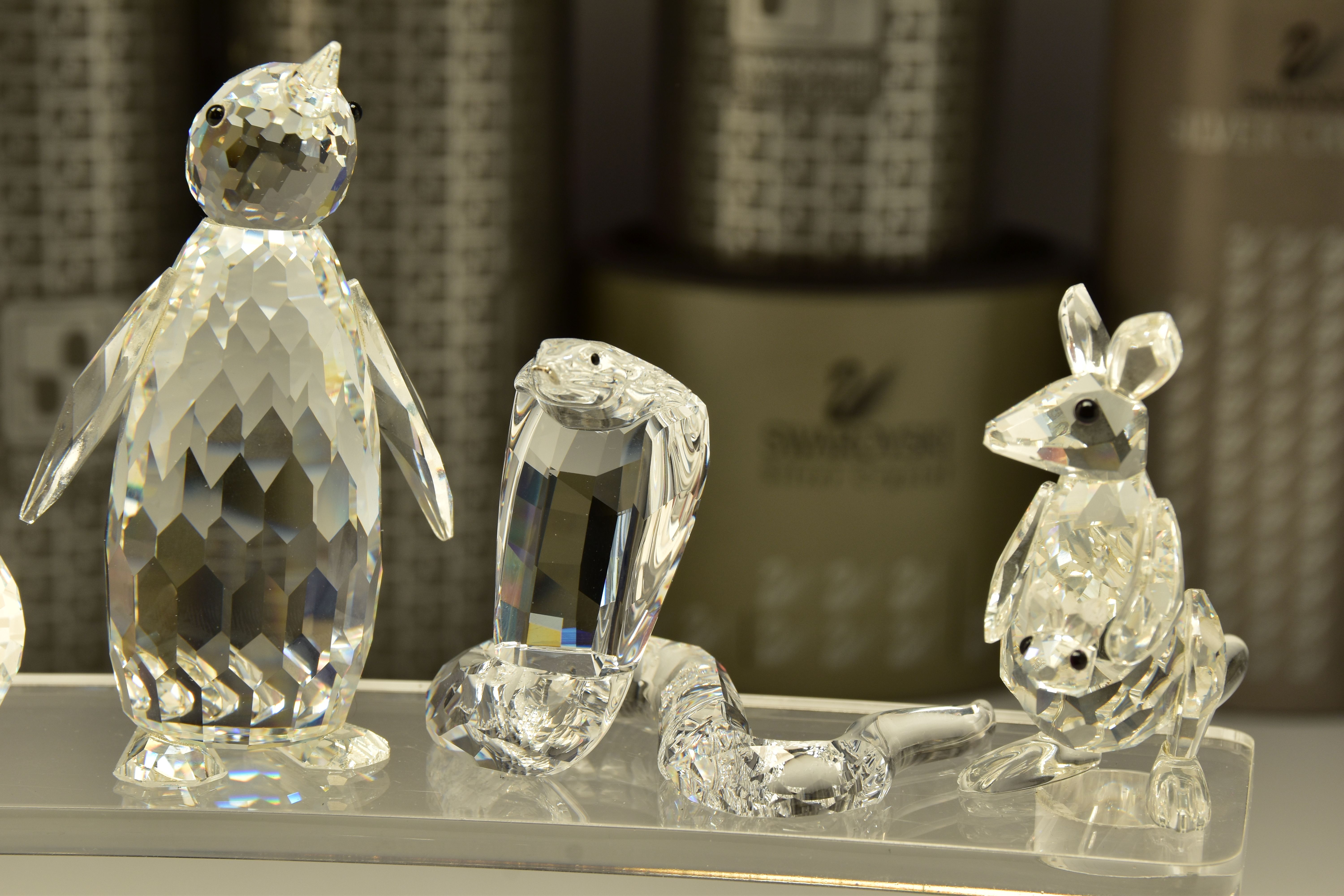 TEN BOXED SWAROVSKI CRYSTAL ORNAMENTS, from various collections, comprising three from African - Image 3 of 7