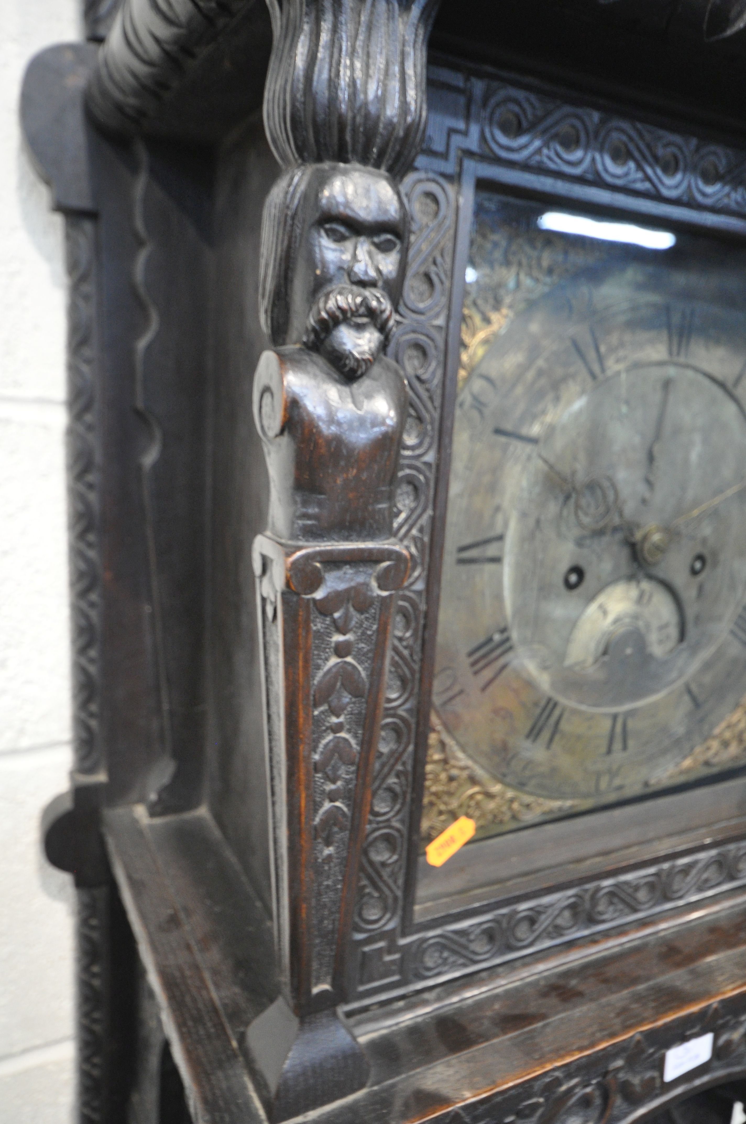 A HEAVILY CARVED EIGHT DAY LONGCASE CLOCK, the 11.5 inch brass and silvered dial singed John - Image 9 of 21