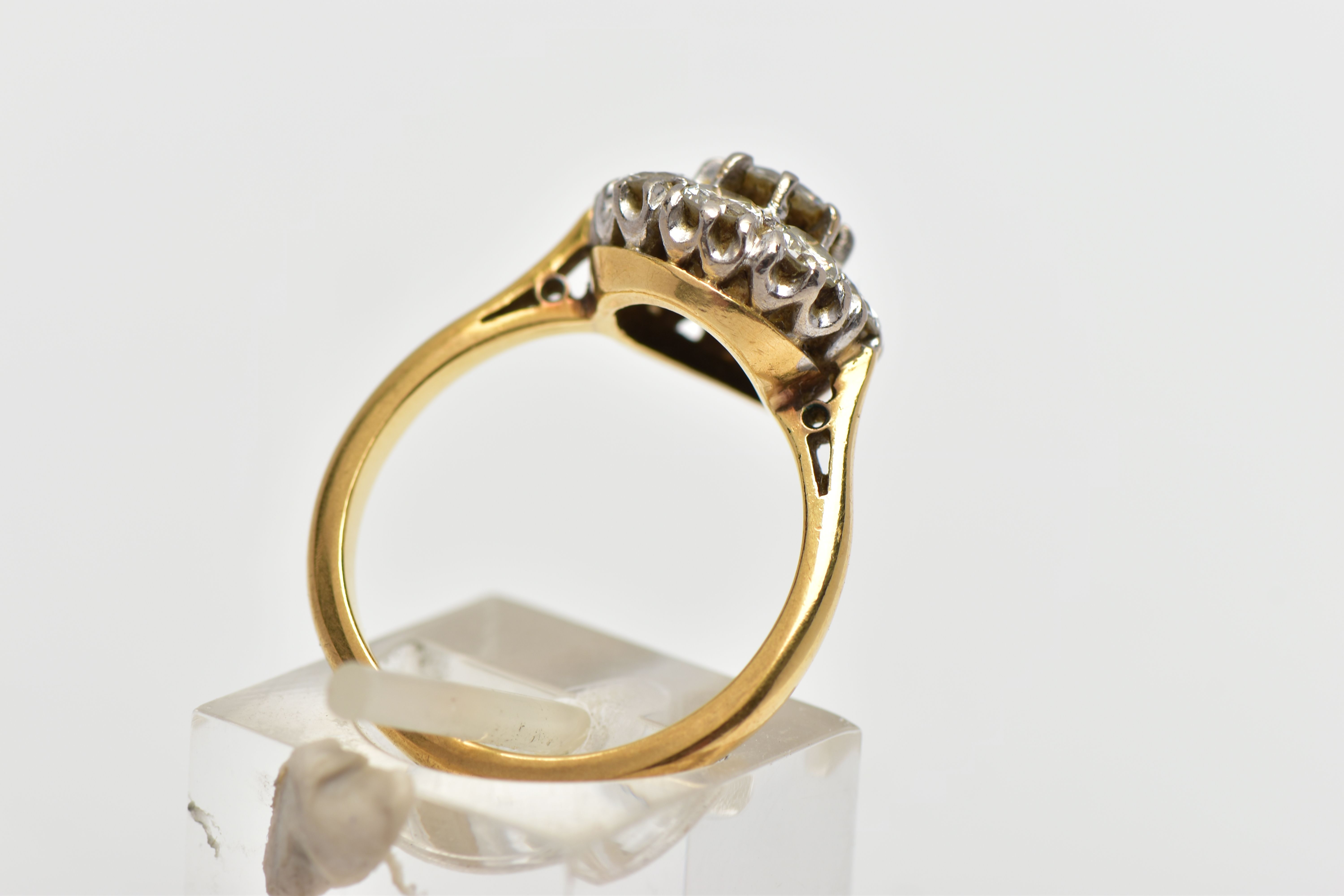 A DIAMOND NINE STONE CLUSTER RING, set with a principal round brilliant cut diamond, surrounded by - Image 3 of 9