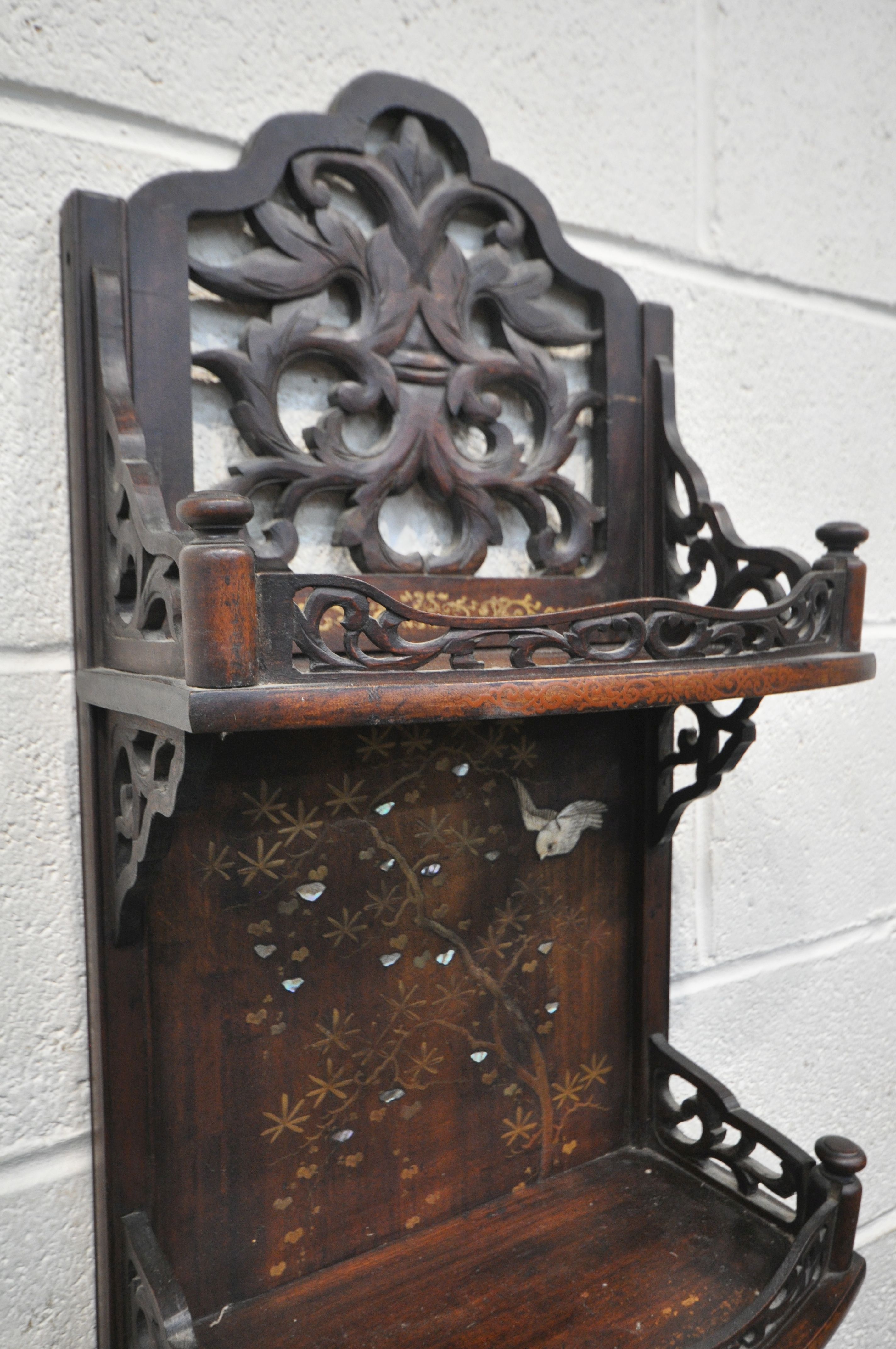 A 20TH CENTURY HARDWOOD JAPANNED WALL SHELF, made up of three shelves, with open foliate fretwork - Image 3 of 6