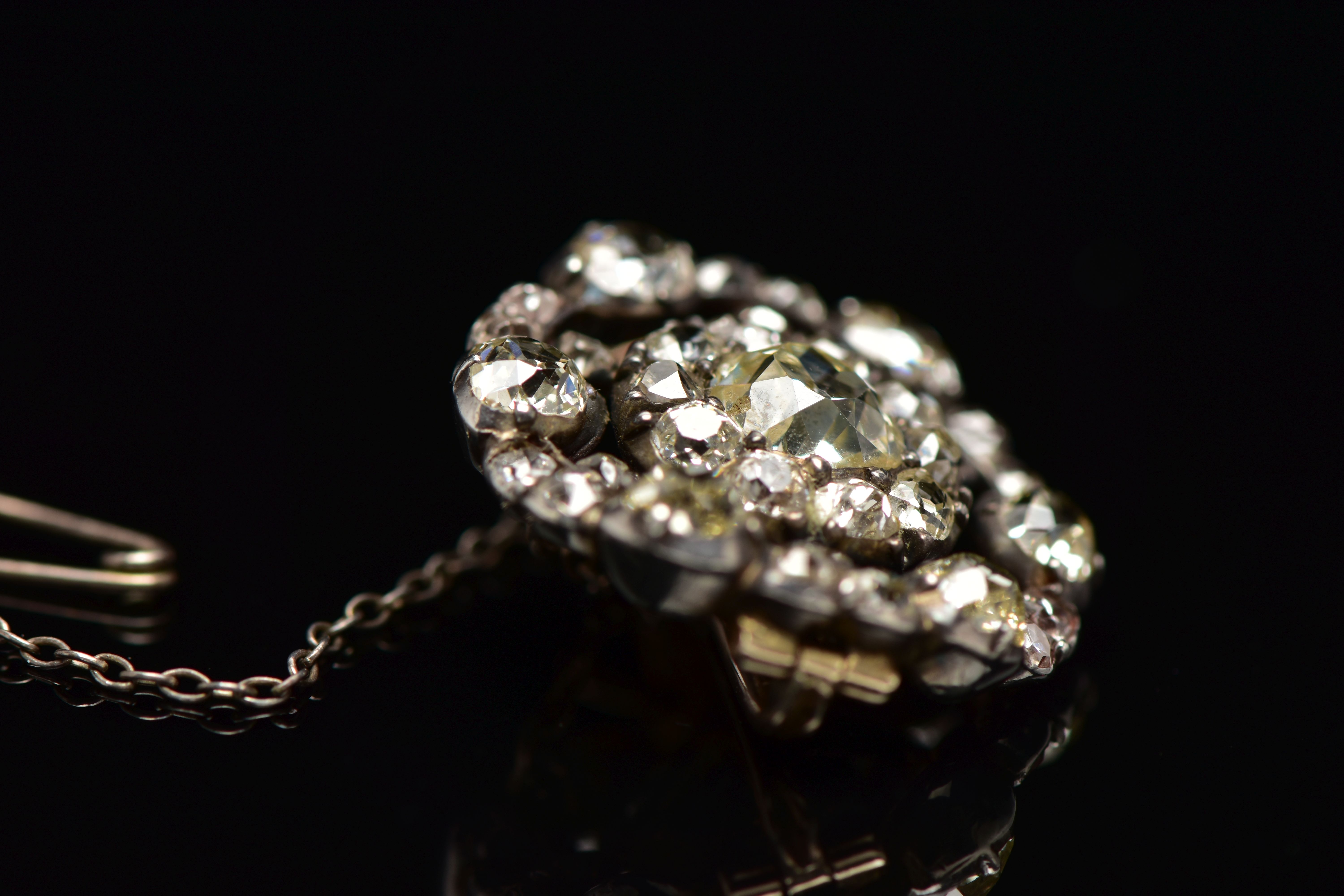 A GEORGIAN DIAMOND CLUSTER BROOCH, set with a principal old European cut diamond, measuring - Image 15 of 17