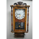 A 19TH CENTURY AMERICAN WALNUT AND INLAID WALL CLOCK, the enamel dial with Roman numerals, with a