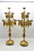 A PAIR OF VICTORIAN ECCLESIASTICAL GOTHIC BRASS TEN LIGHT CANDELABRA IN THE STYLE OF PUGIN, the