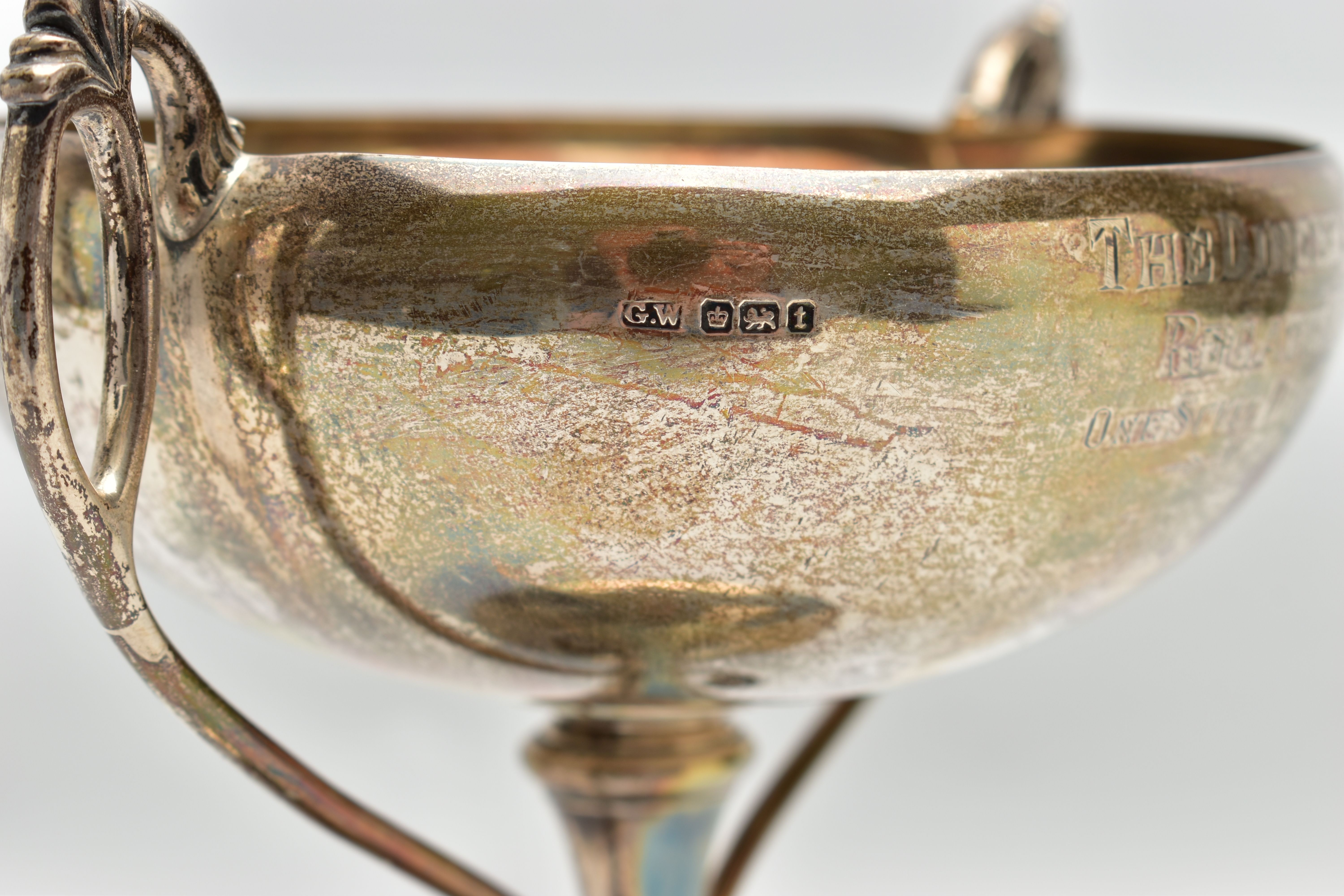 A GEORGE V SILVER TWIN HANDLED TROPHY CUP, the shallow silver cup on a slender pedestal with cast - Image 3 of 8