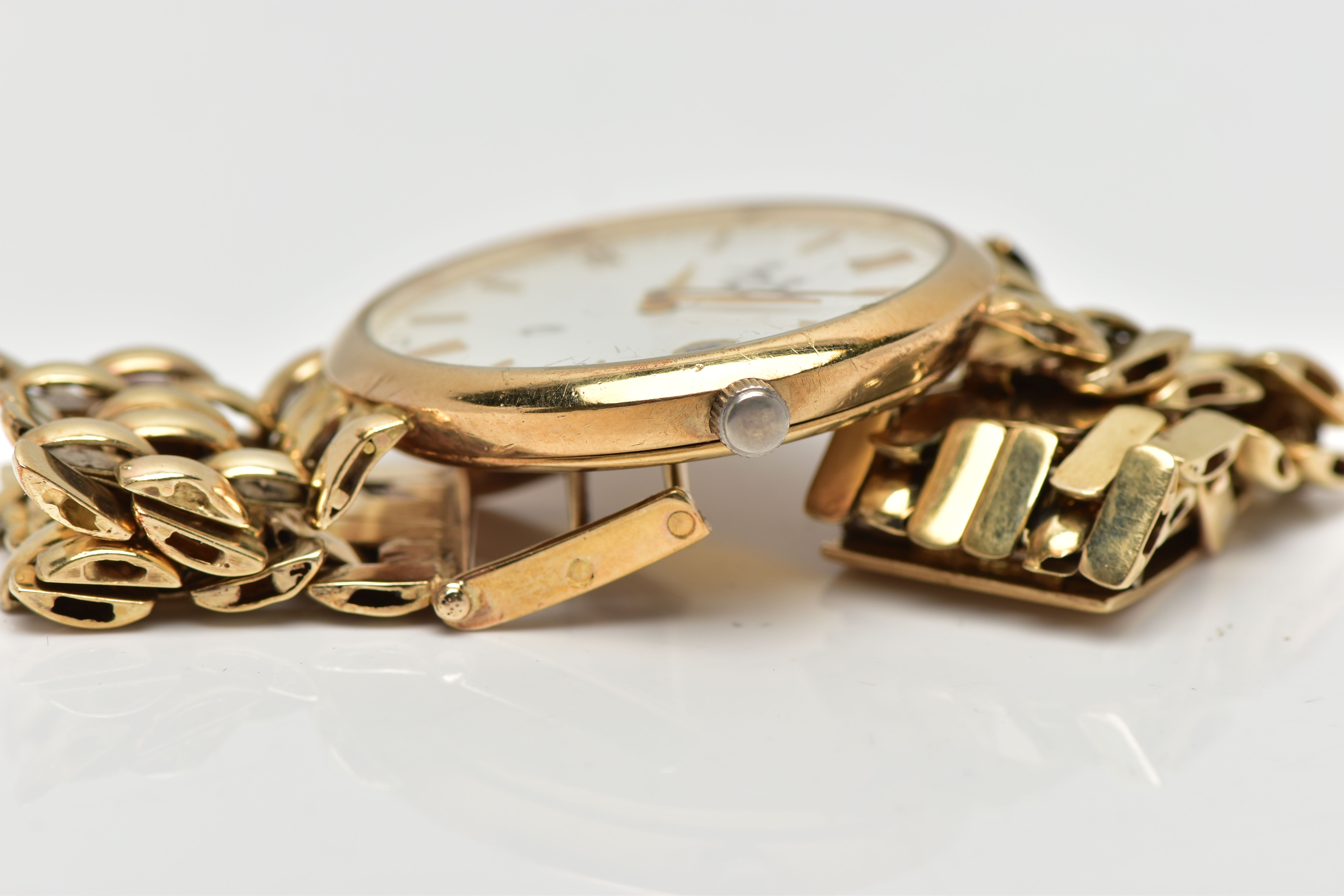 A JEAN JACOT GENEVE YELLOW METAL QUARTZ WRISTWATCH, the white dial with gold tone hourly applied - Image 6 of 6