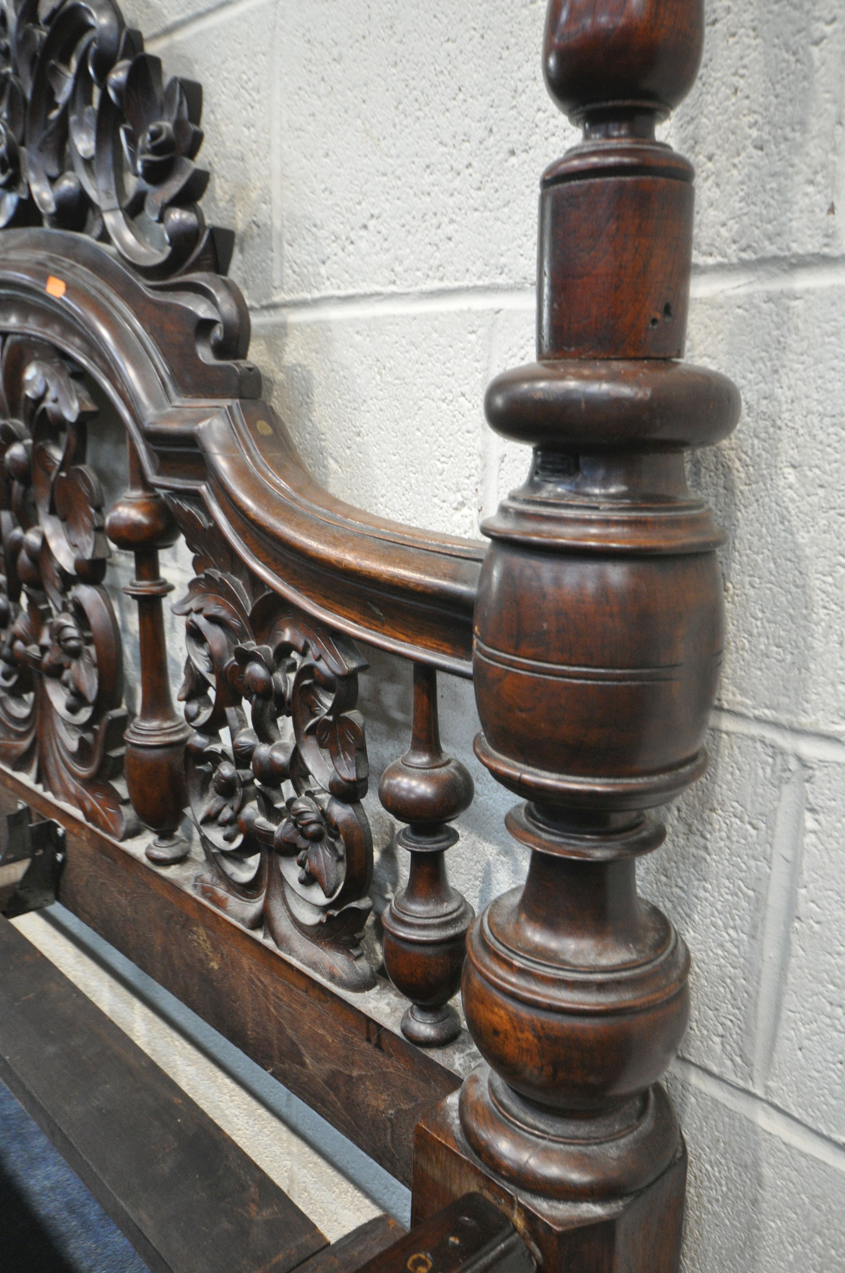 AN 18TH CENTURY OAK AND MAHOGANY 4FT6 FOUR POSTER BED, having a foliate open fretwork headboard, - Image 9 of 9