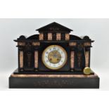 A LATE VICTORIAN BLACK SLATE AND MARBLE INSET MANTEL CLOCK OF ARCHITECTURAL FORM, the case with gilt