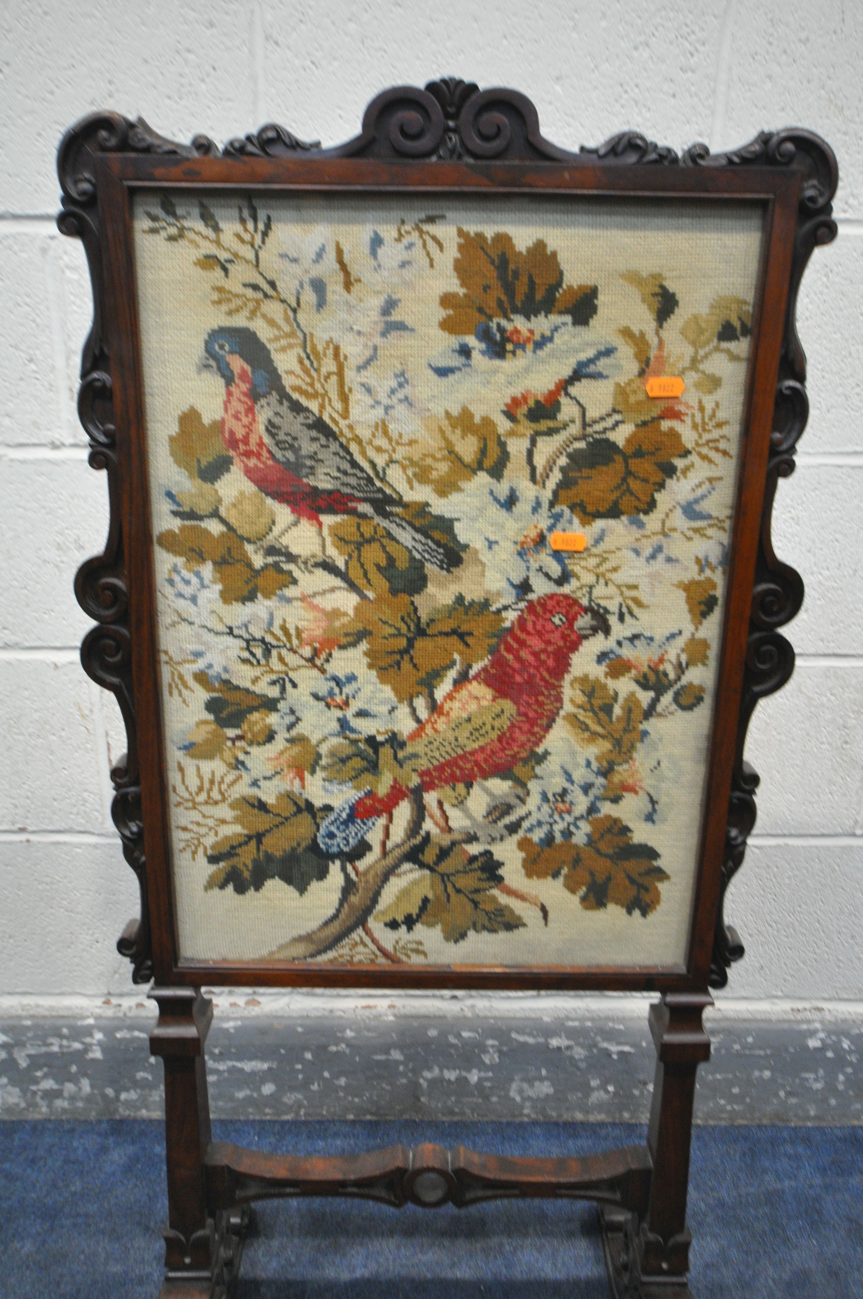 AN EARLY VICTORIAN ROSEWOOD FIRESCREEN, the frame with foliate scrolls, the glass panel enclosing - Image 3 of 5