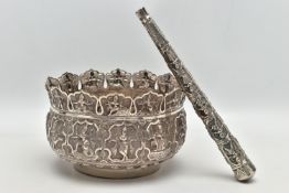 AN INDIAN WHITE METAL BOWL, with multi-point cut rim, repousse decorated throughout with deities and