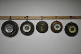 FIVE VARIOUS LATE VICTORIAN/EDWARDIAN CIRCULAR ANEROID BAROMETERS, largest diameter 24cm (5)(