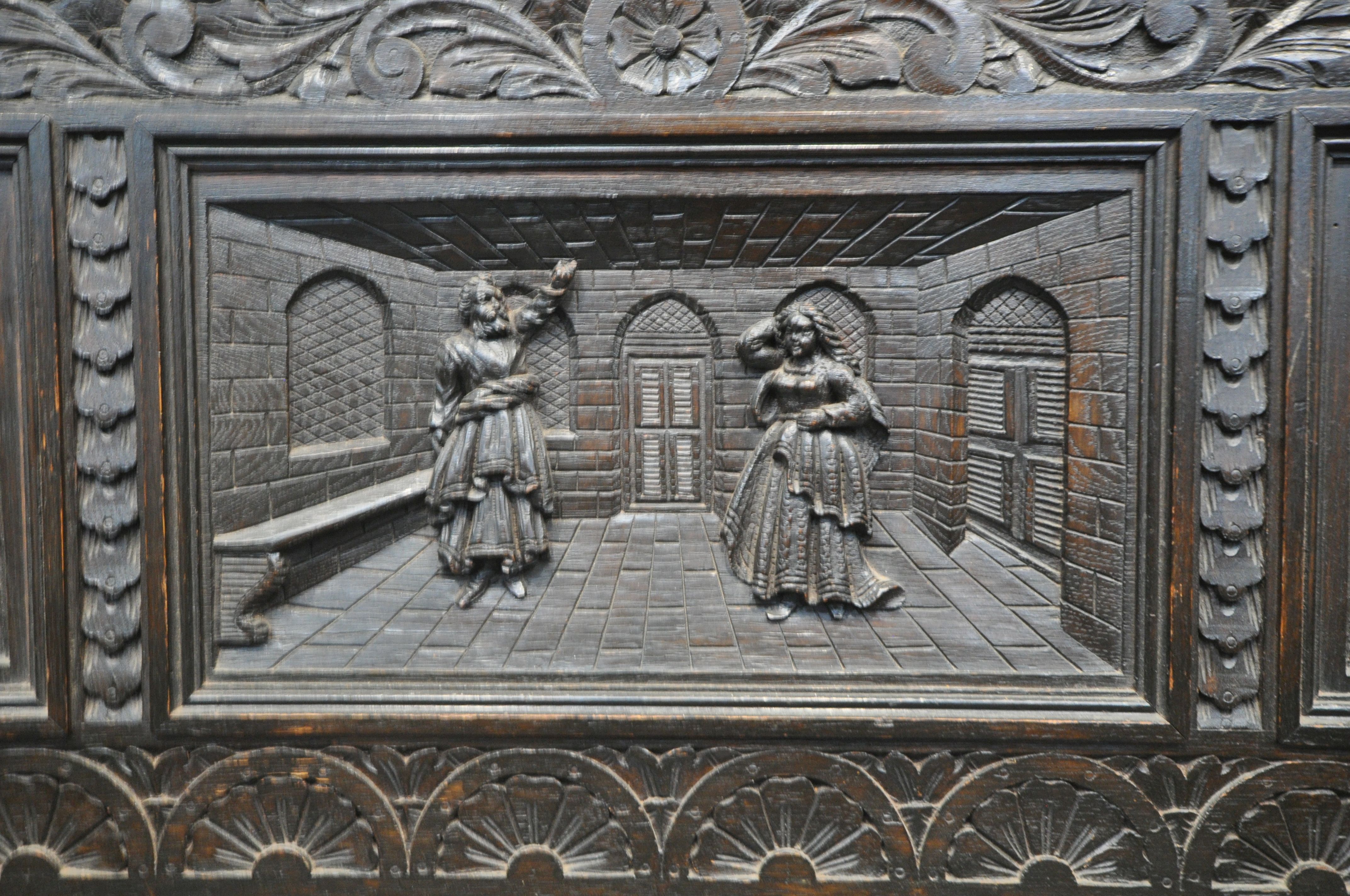 A LATE 19TH CENTURY CARVED OAK JACOBETHAN STYLE HALL SETTLE/BENCH, the two outer panels depicting - Image 5 of 9