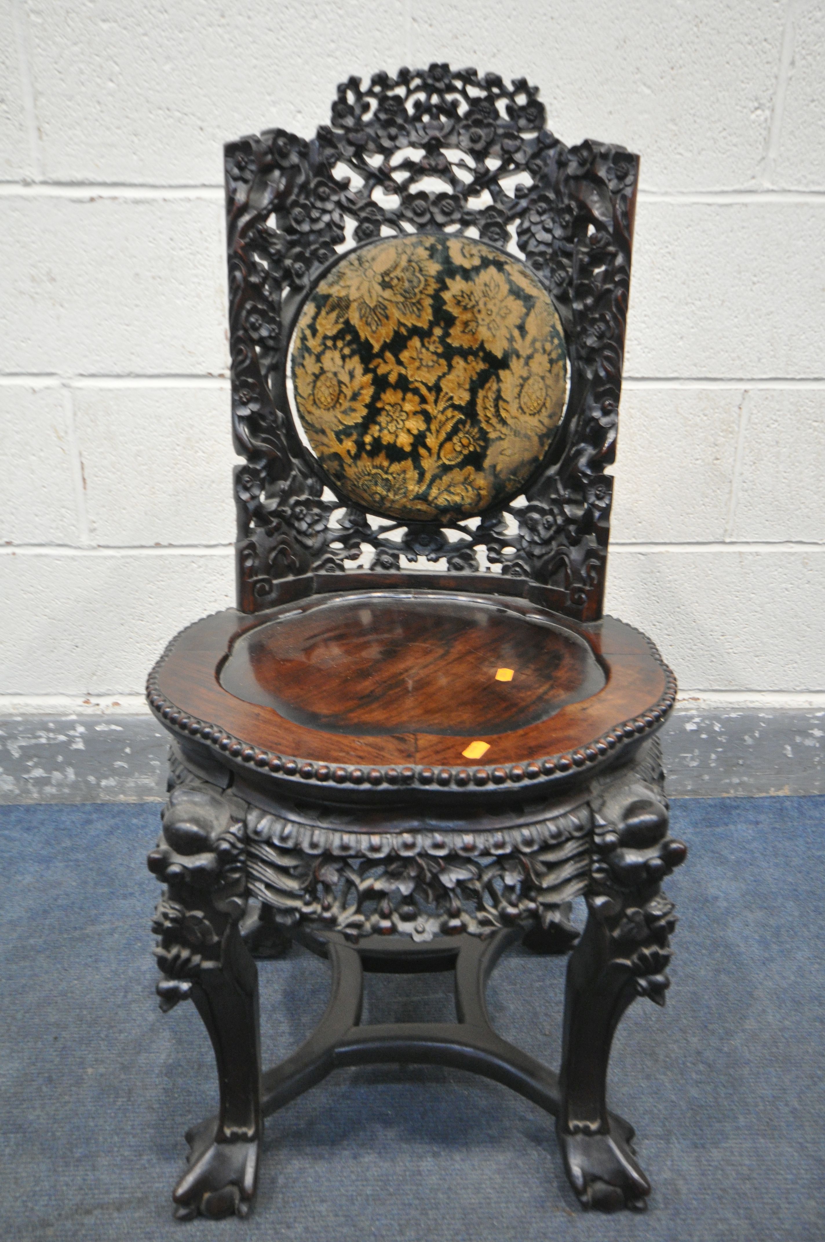 AN INTRICATLY CARVED CHINESE HARDWOODCHAIR, late 19th/early 20th century, flower heads and vines - Image 2 of 10