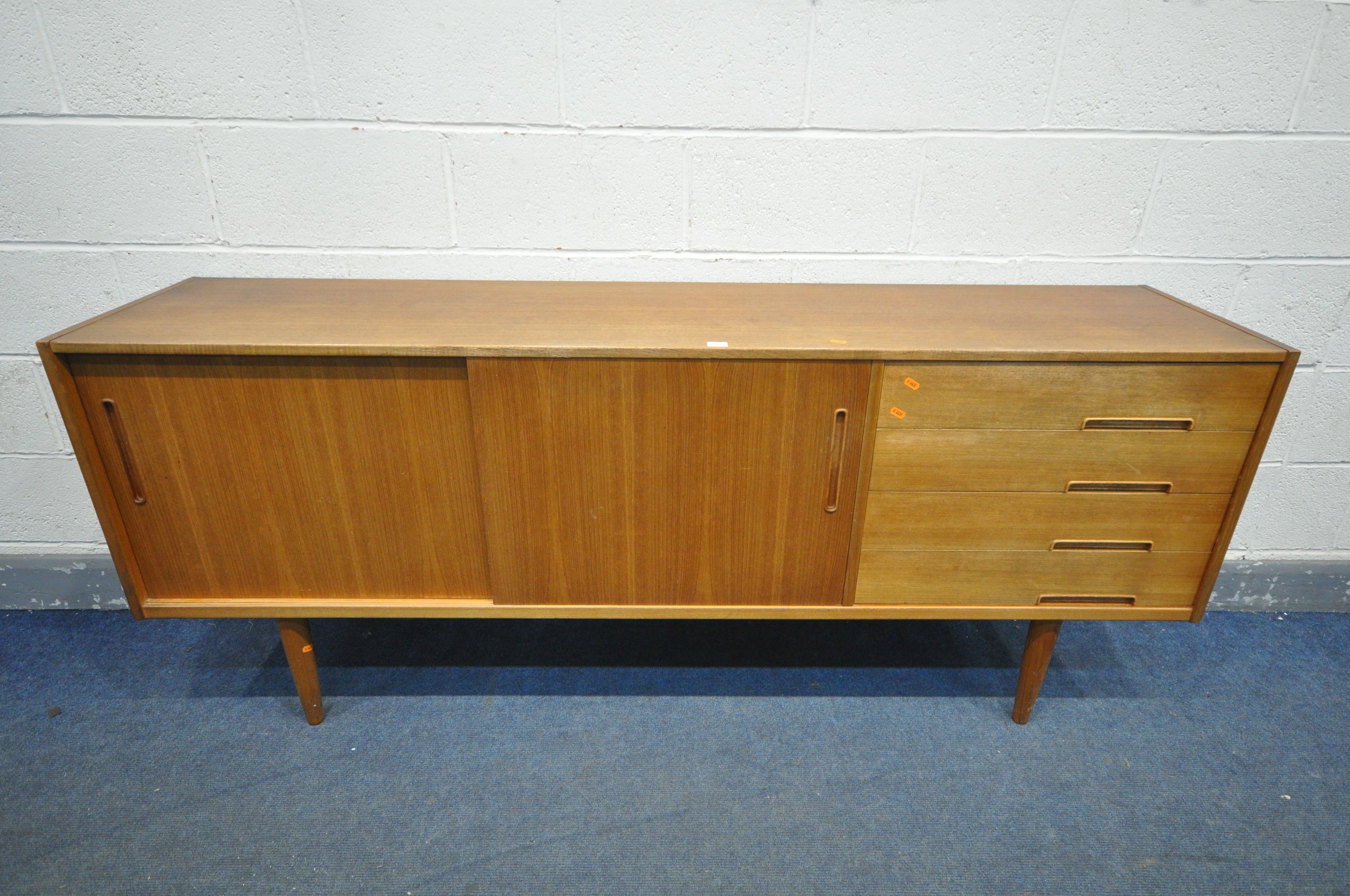 NILS JONSSON FOR TROEDS, A MID CENTURY MODEL 'TRENTO' TEAK SIDEBOARD, with double sliding doors,