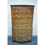 A GEORGE IV WALNUT BOWFRONT CHEST ON CHEST, of two short over six long graduated drawers, brass