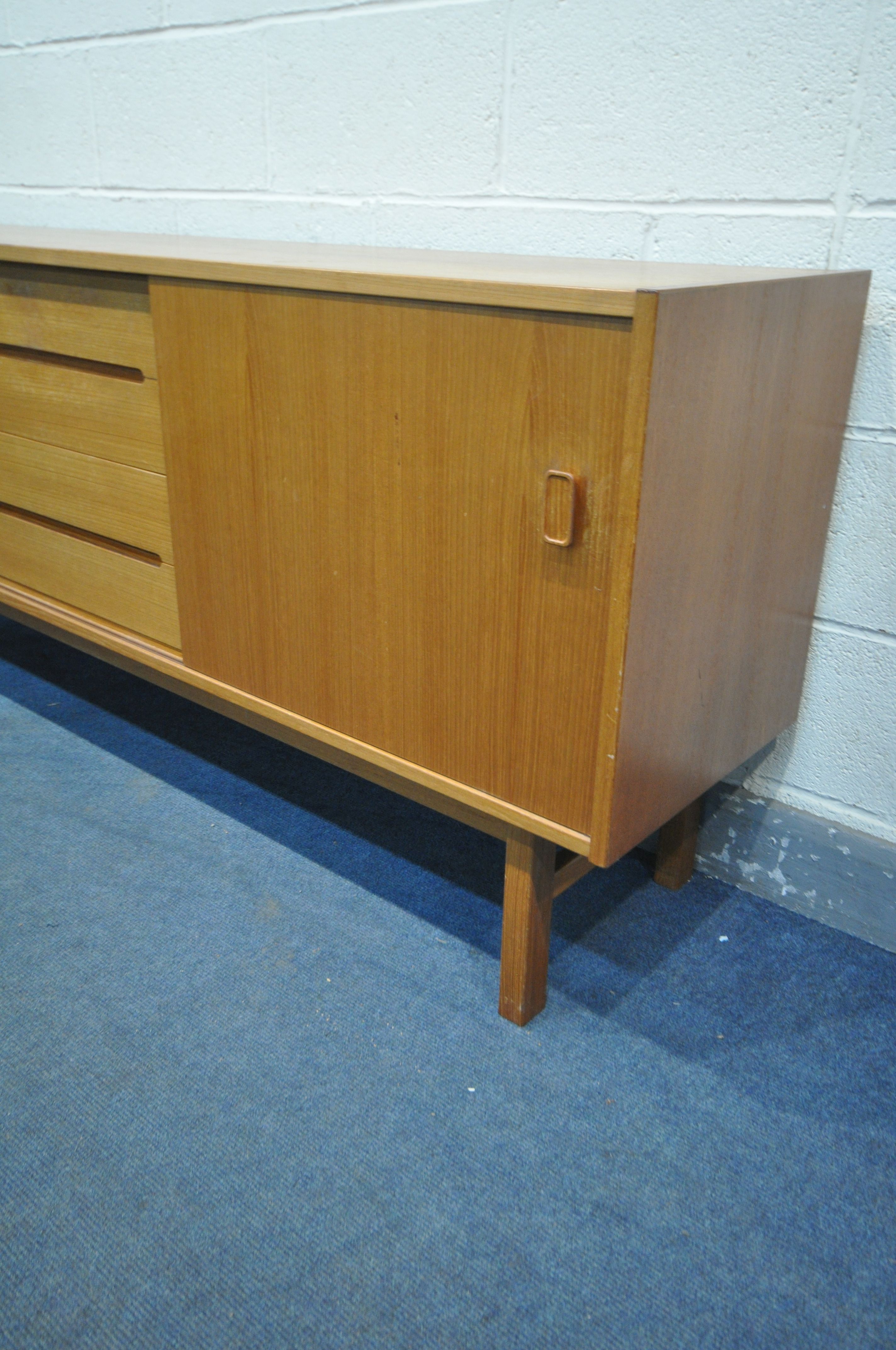 NILS JONSSON FOR HUGO TROEDS, A MID CENTURY MODEL TEAK SIDEBOARD, with two sliding doors that are - Image 3 of 7