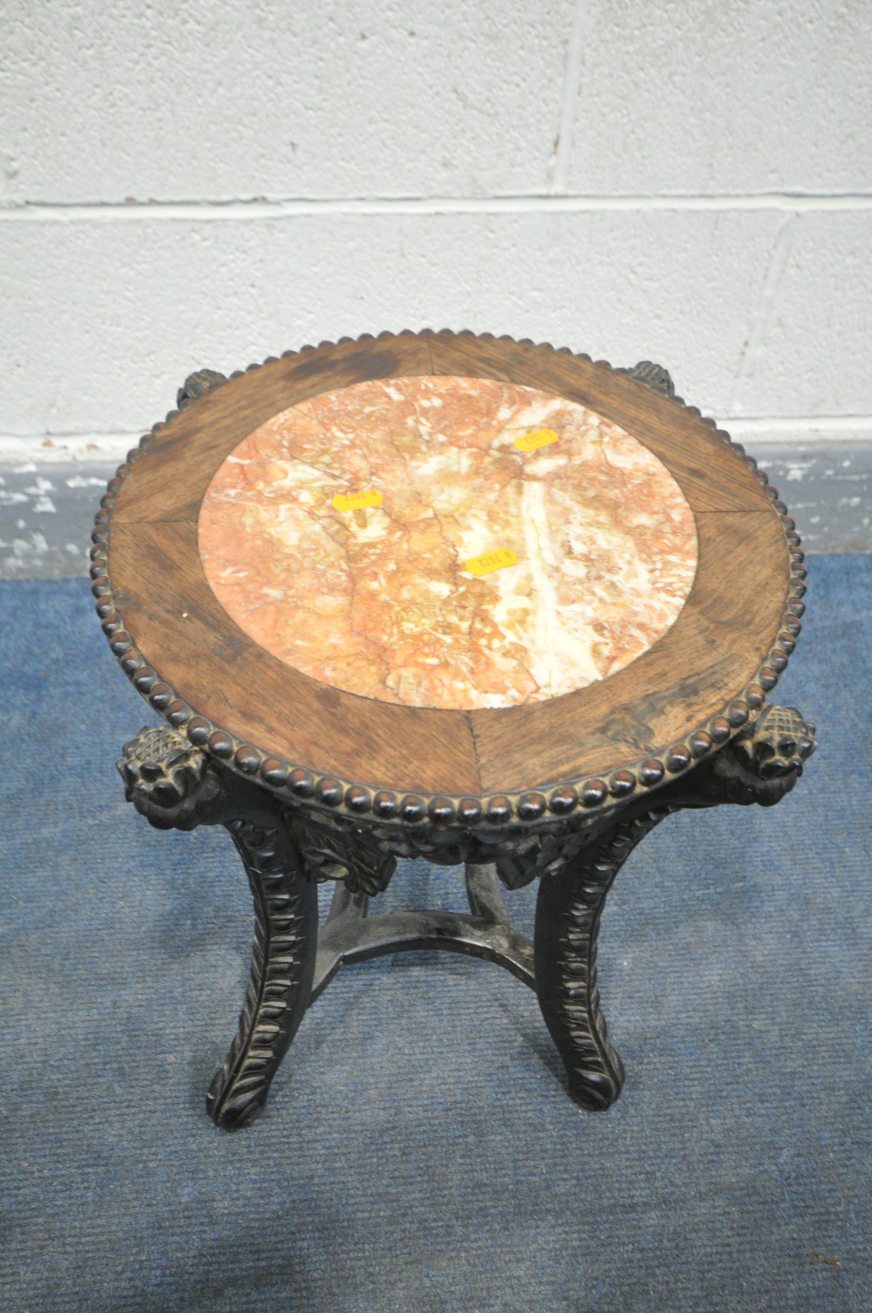 AN INTRICATLY CARVED CIRCULAR CHINESE ROSEWOOD SIDE TABLE, with a veined marble insert, the four - Image 3 of 8