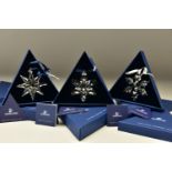 THREE BOXED SWAROVSKI ANNUAL CHRISTMAS ORNAMENTS 2008, 2009 AND 2010 (942045, 983702 and 1041301),