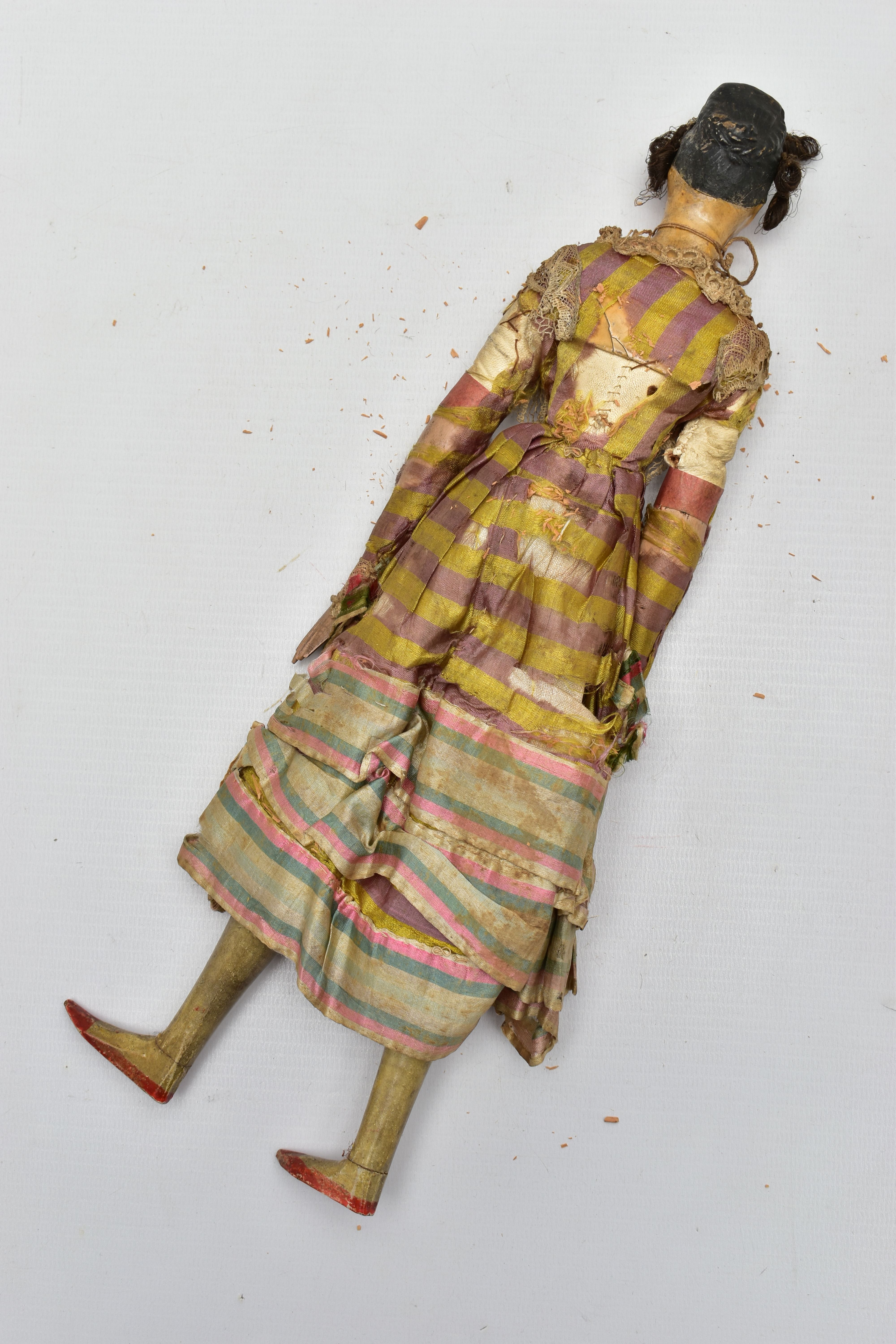 AN EARLY 19TH CENTURY PAPIER MACHE, LEATHER AND WOODEN DOLL, black painted high bun with inserted - Image 7 of 9