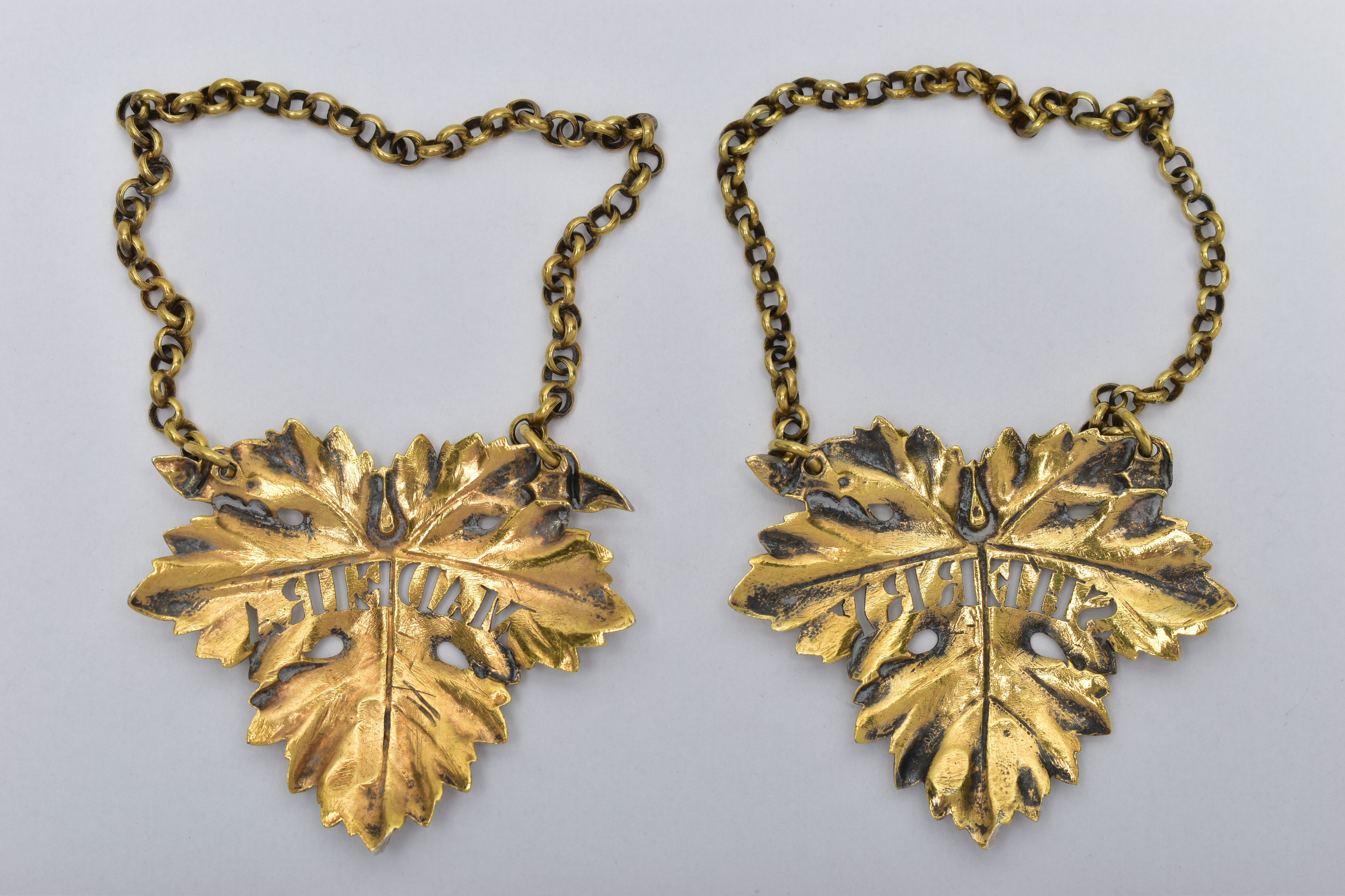 A PAIR OF GEORGE IV SILVER GILT DECANTER LABELS, cast as vine leaves, named for 'SHERRY' and ' - Image 2 of 3
