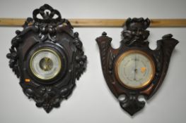 A 20TH CENTURY BLACK FOREST STYLE ANEROID BAROMETER, the frame having a ribbon surmount, foliage,