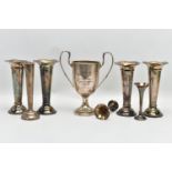 A SILVER TWIN HANDLED TROPHY CUP, A SET OF FOUR GEORGE V SILVER TRUMPET SHAPED POSY VASES AND